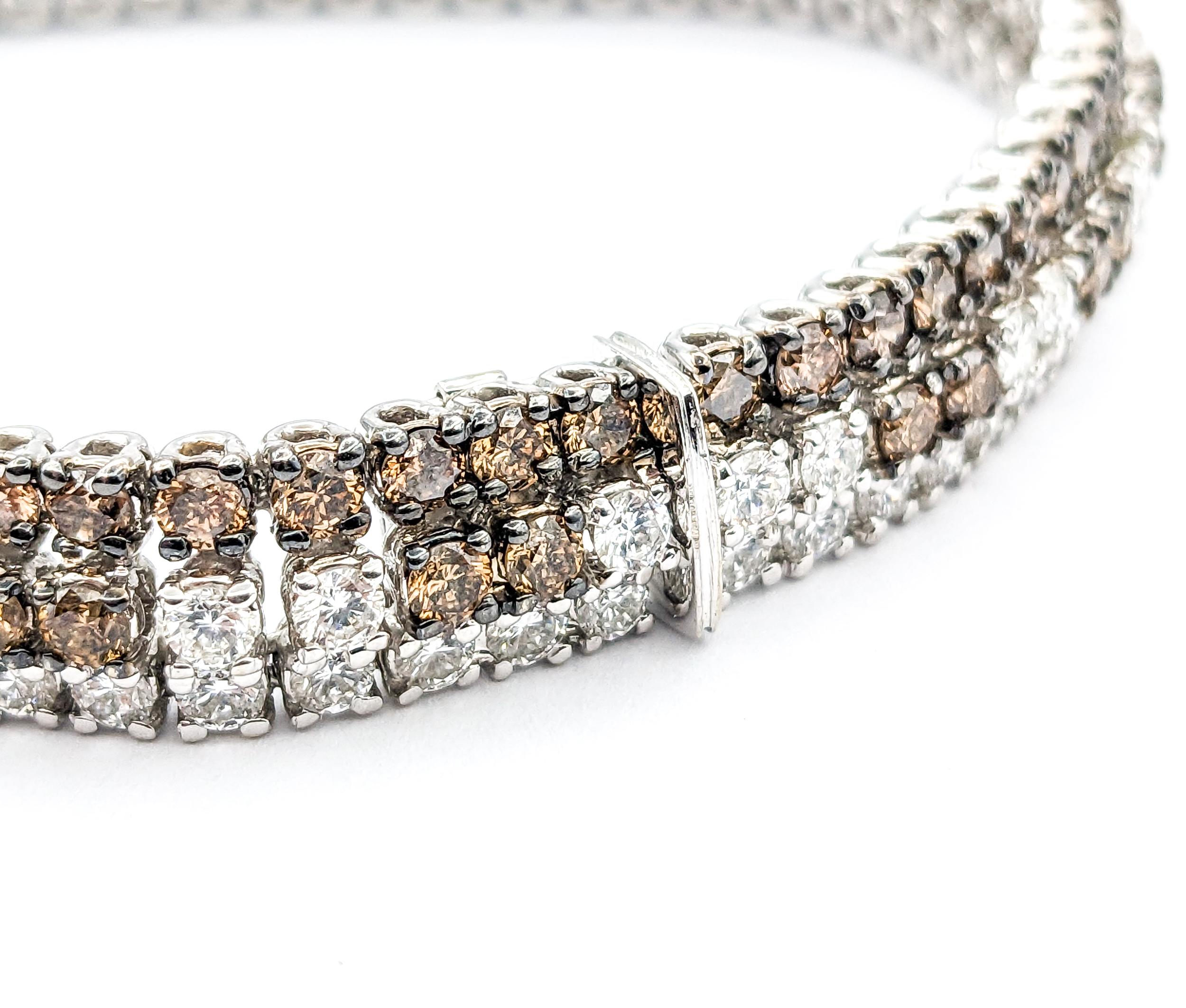 11.85ctw Diamond Crivelli 3 Line Bi-Color Bracelet In White Gold

This magnificent Crivelli Bracelet 3 Line Bi-Color is a luxurious piece crafted in 18kt white gold, showcasing a stunning array of round diamonds totaling 11.85 carats. The diamonds