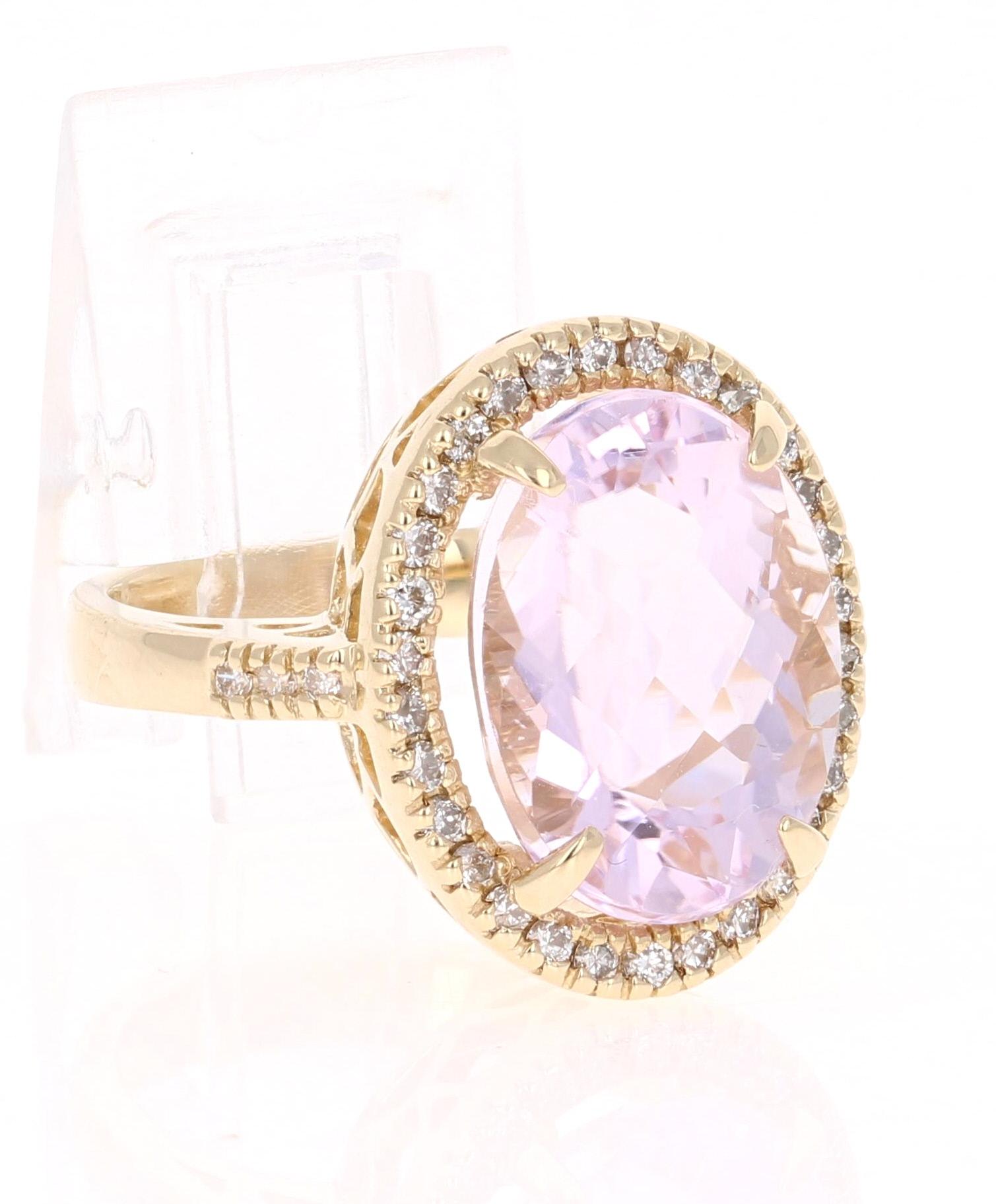 This beautiful piece has a 11.33 carat Oval Cut Kunzite that is set in the center of the ring, it is surrounded by 36 Round Cut Diamonds that weigh 0.53 carats.  The total carat weight of the ring is 11.86 carats. 

The ring is made in 14K Yellow