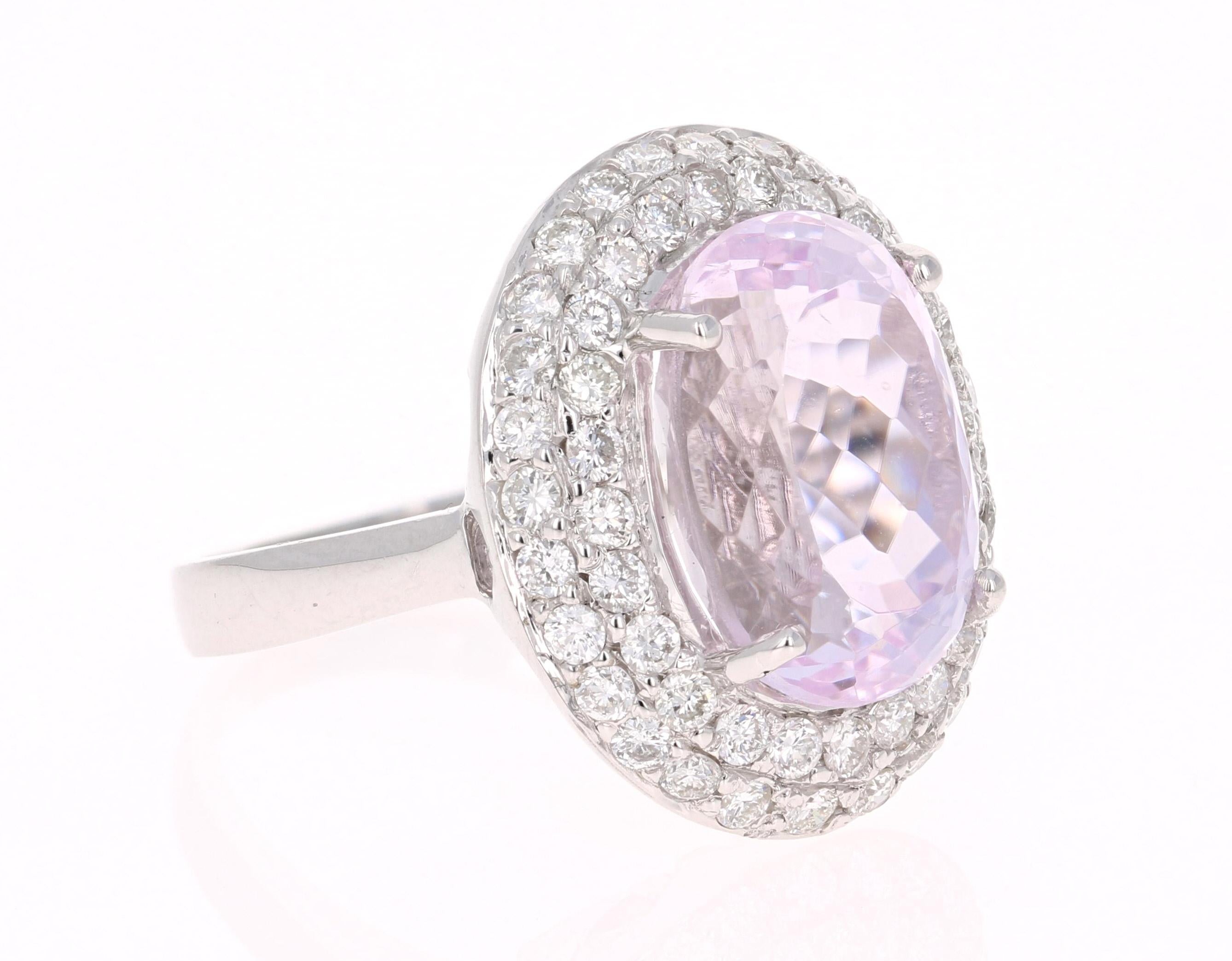 A lovely Engagement Ring Option or as an alternate to a Pink Diamond Ring! This simply stunning Kunzite Diamond Ring has a 10.58 Carat Oval Cut Kunzite as its center and has thick double halo of 55 Round Cut Diamonds that weigh 1.31 carats. The