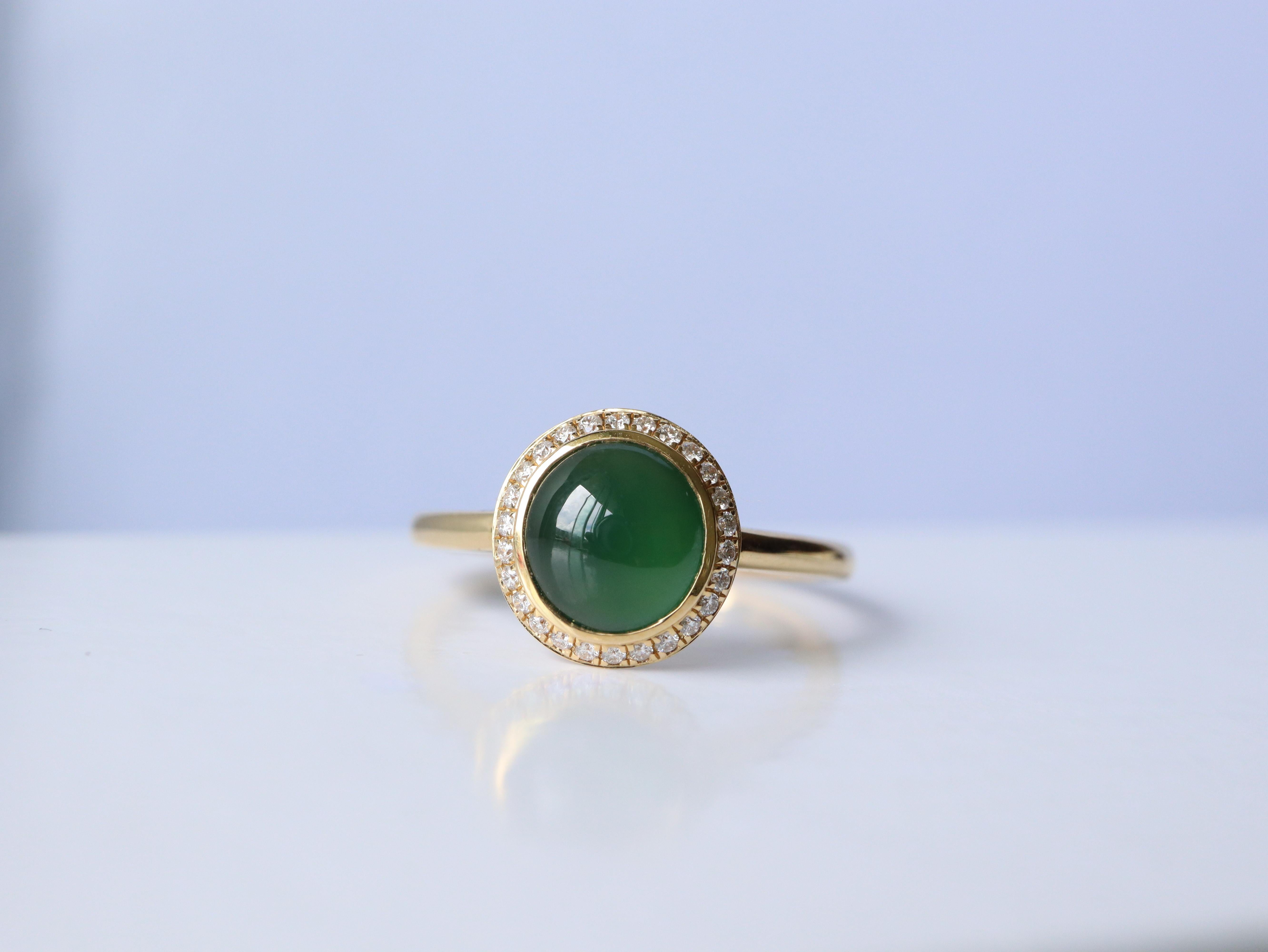 Burmese type A Jadeite Jade Ring

Jade - 1.18Ct (Approx)

Measurement of jade - 7.1x6.7mm

Color - Green

Clarity - very slightly included and Translucent (no breaks, No cracks)

Treatment- None ( No bleach , No dye , No treatment, No