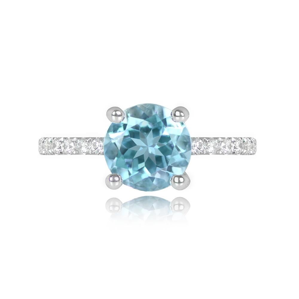 A captivating aquamarine and diamond ring with a 1.18-carat round-cut aquamarine in prongs. The shoulders are adorned with round brilliant-cut diamonds totaling around 0.26 carats. Crafted in 18k white gold.


Ring Size: 6.5 US, Resizable 
Metal: