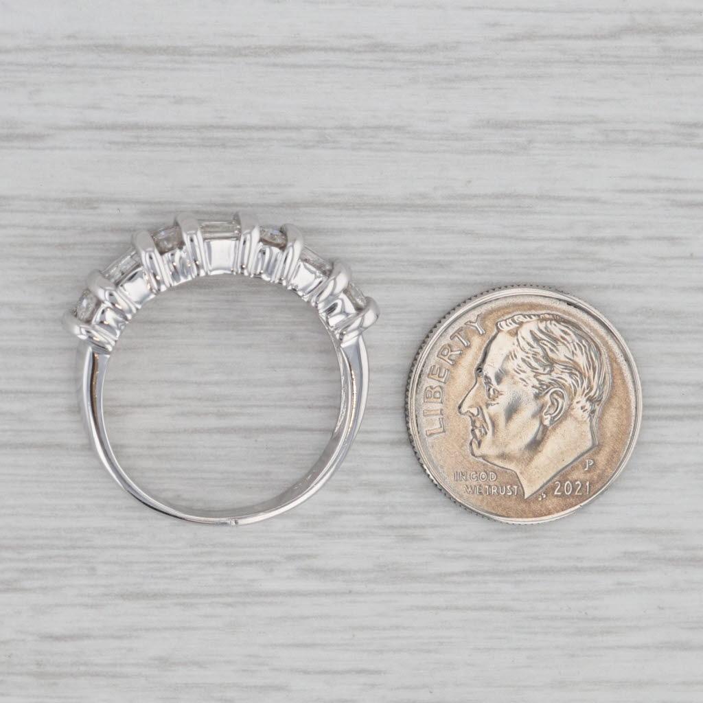 Gemstone Information:
- Natural Diamonds -
Total Carats - 1.18ctw
Cut - Baguettes and Round brilliant
Color - G-I
Clarity - I1-I2

Metal: 14k White Gold
Weight: 6.3 Grams 
Stamps: 14k
Face Height: 6.7mm 
Rise Above Finger: 4.6mm
Band / Shank Width: