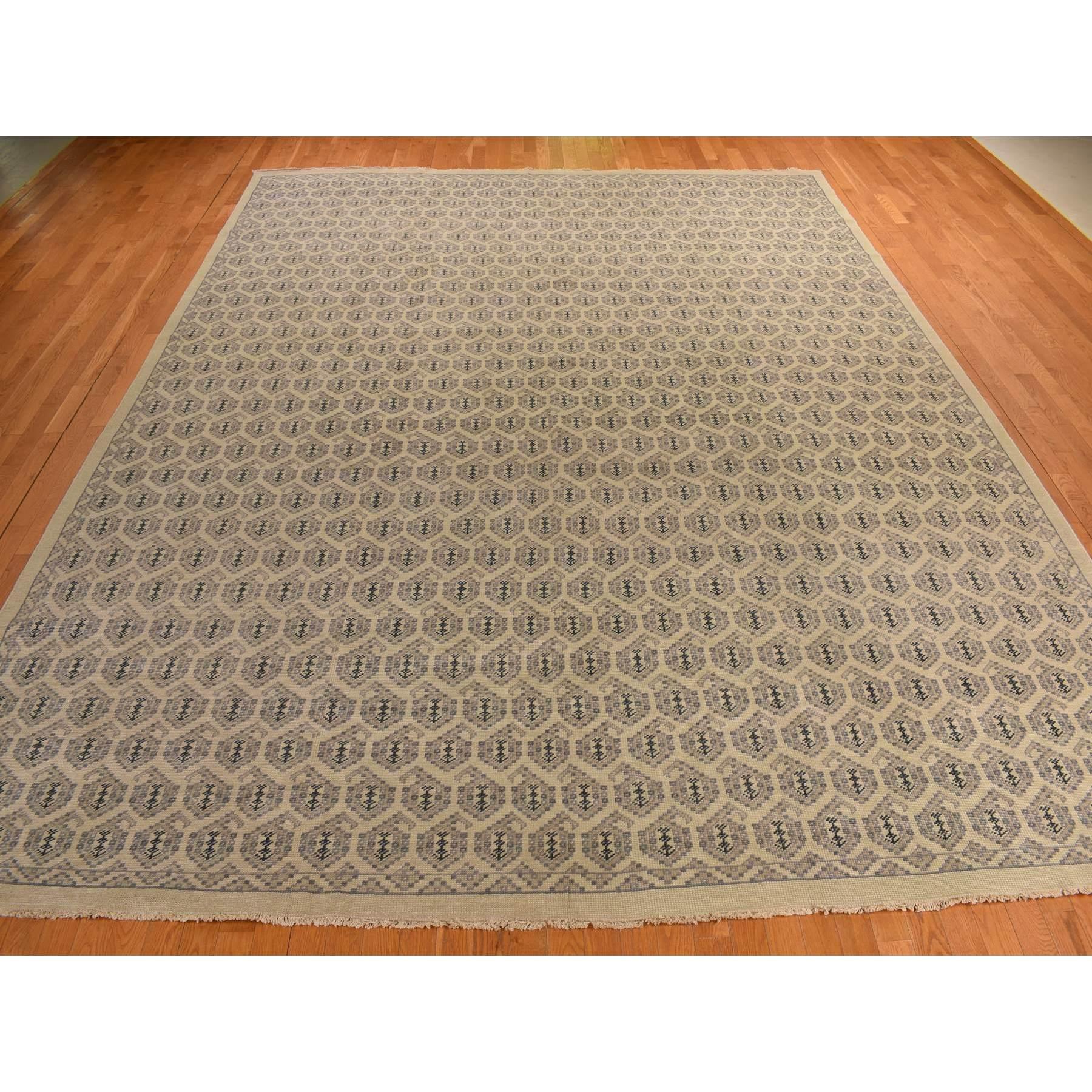 Dutch White, Turkish Knot Paisley Design, 100% Wool, Hand Knotted, Oversized, Oriental Rug
Primary materials: Wool
Latex: No
Pile height: 0.25 Inches
Style: Transitional
Primary color: Ivory
Secondary colors: Black, Gray, Green
Pattern: Oriental