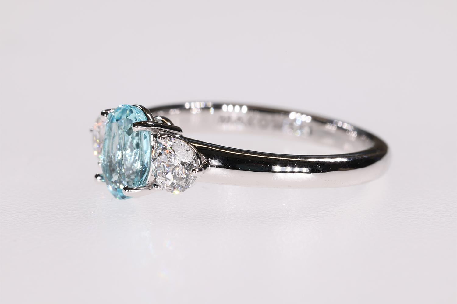 Modern 1.19 Carat Blue Paraiba Tourmaline & Sirius Star 3 stone Diamond Engagement Ring For Sale