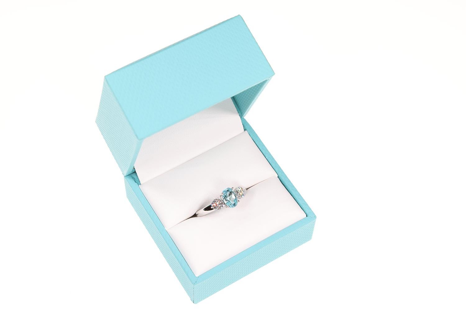 1.19 Carat Blue Paraiba Tourmaline & Sirius Star 3 stone Diamond Engagement Ring For Sale 2