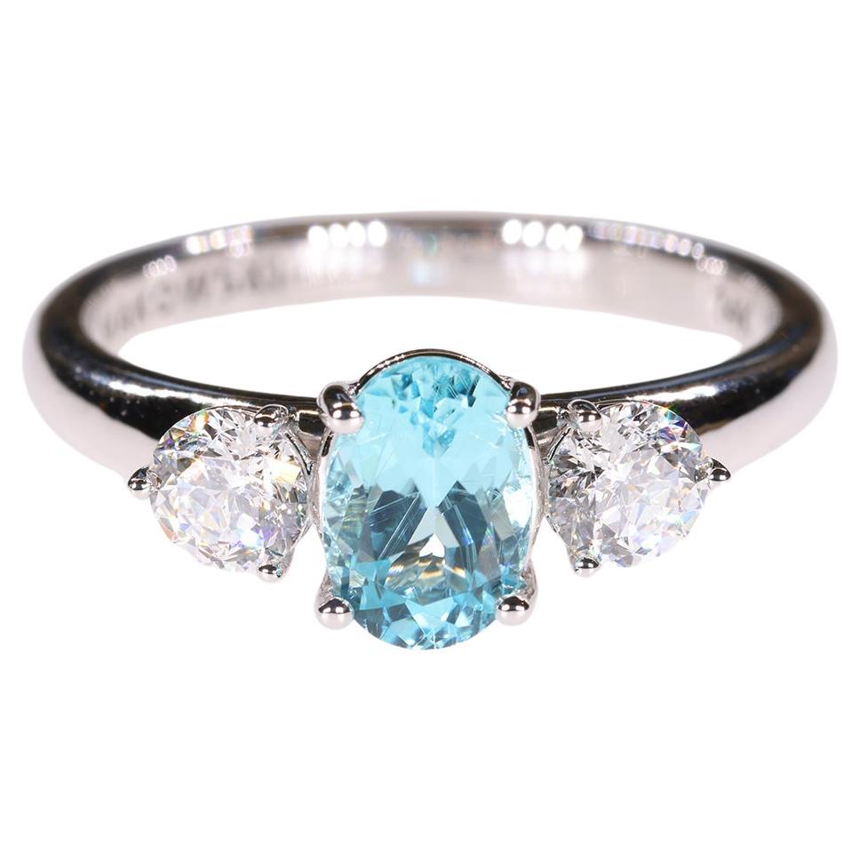 1.19 Carat Blue Paraiba Tourmaline & Sirius Star 3 stone Diamond Engagement Ring For Sale