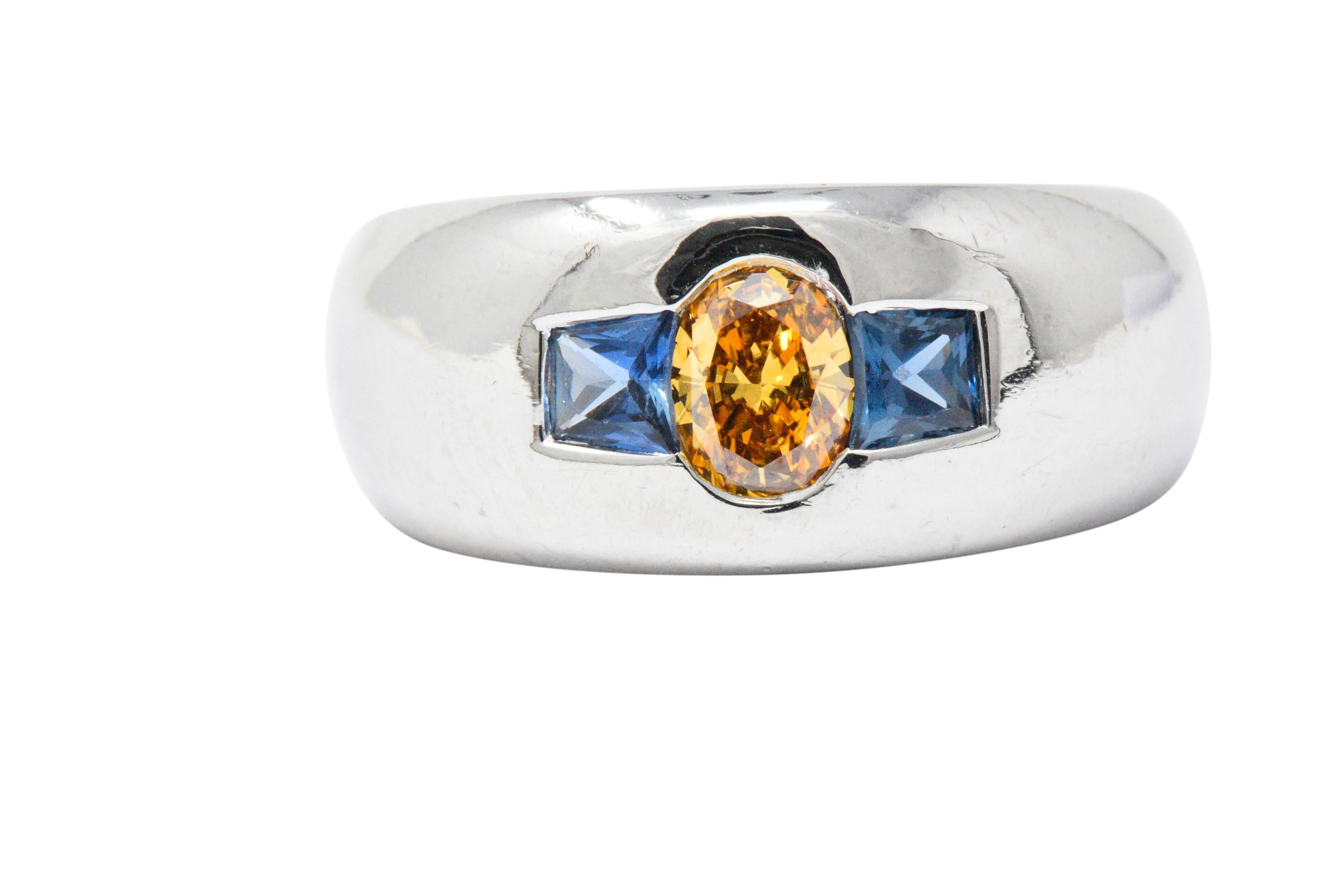 Modern 1.19 Carat Fancy Yellow-Orange Diamond, Sapphire and Platinum Men's Ring, GIA