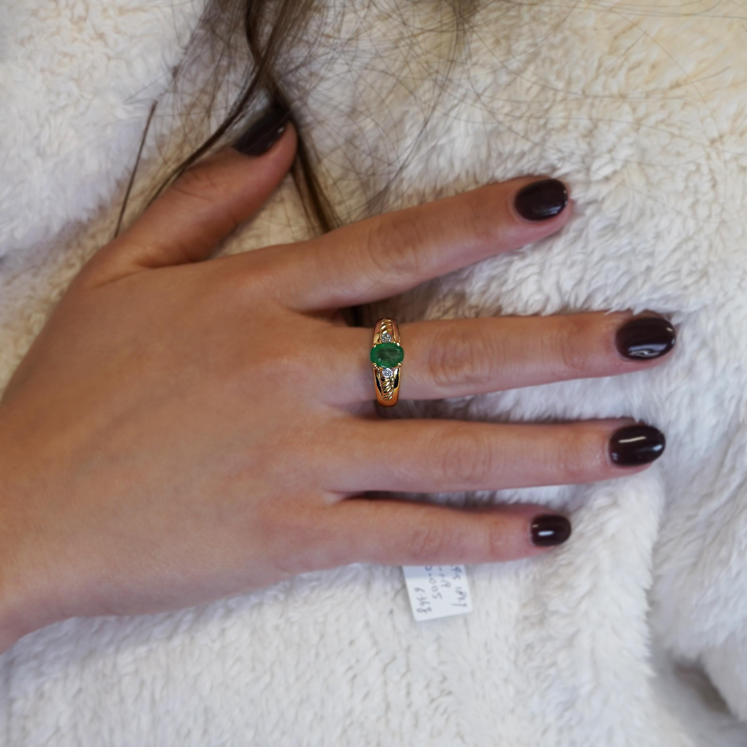 A striking 1.19-carat oval emerald sits at the heart of this 14K yellow gold ring, accented by natural diamonds and a bold, intricately designed band for a timeless yet distinctive look.

Details:
Item Type: Statement Ring
Metal: 14K Yellow Gold