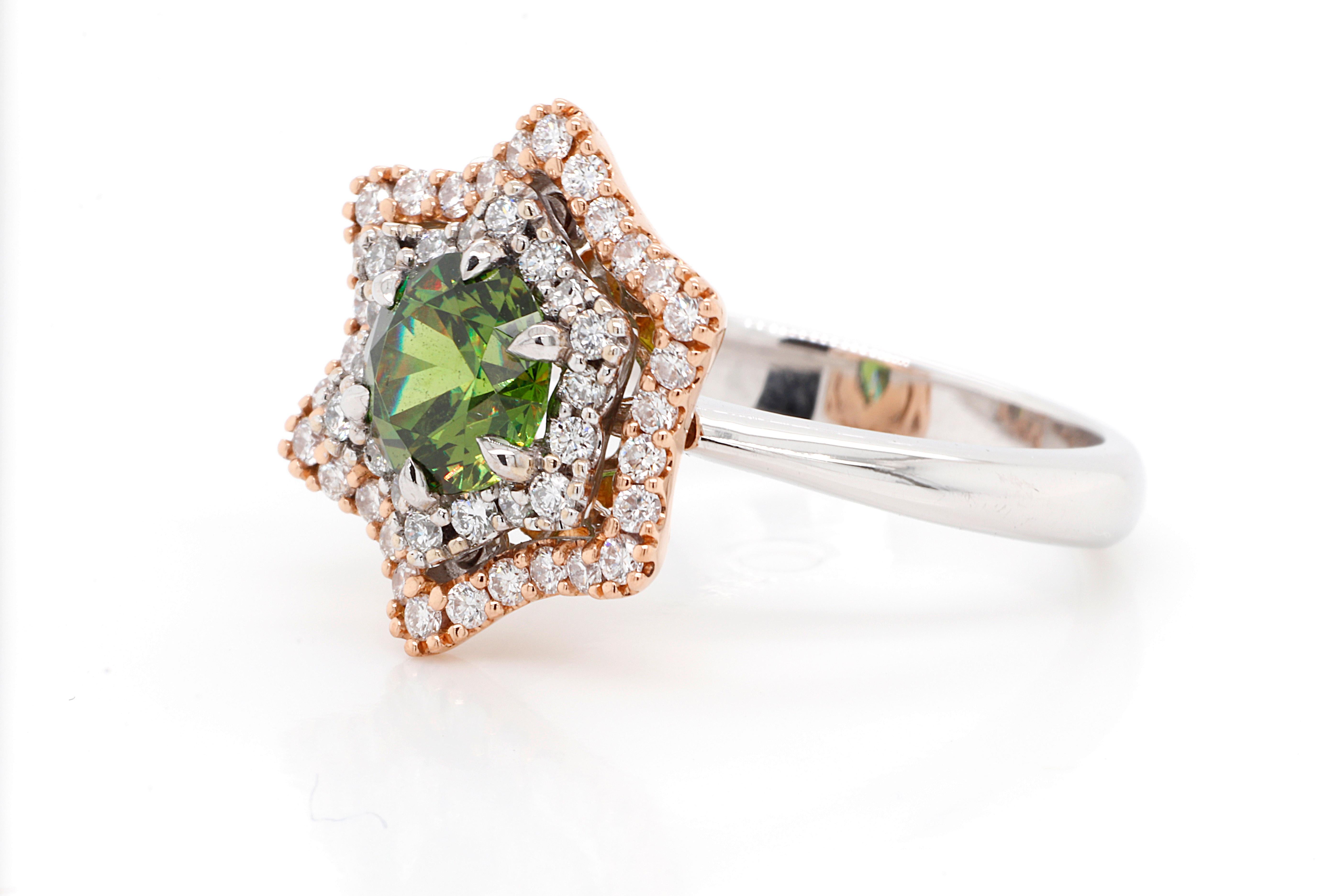 Sophisticated 18K White Gold Demantoid Ring with Diamonds. Featuring 1.19 ct of top quality Russian Demantoid combined with natural 0.43 ctw Diamonds G-H color and VVS1 clarity. 
Demantoid is called a star of garnets, it's name means diamond-like