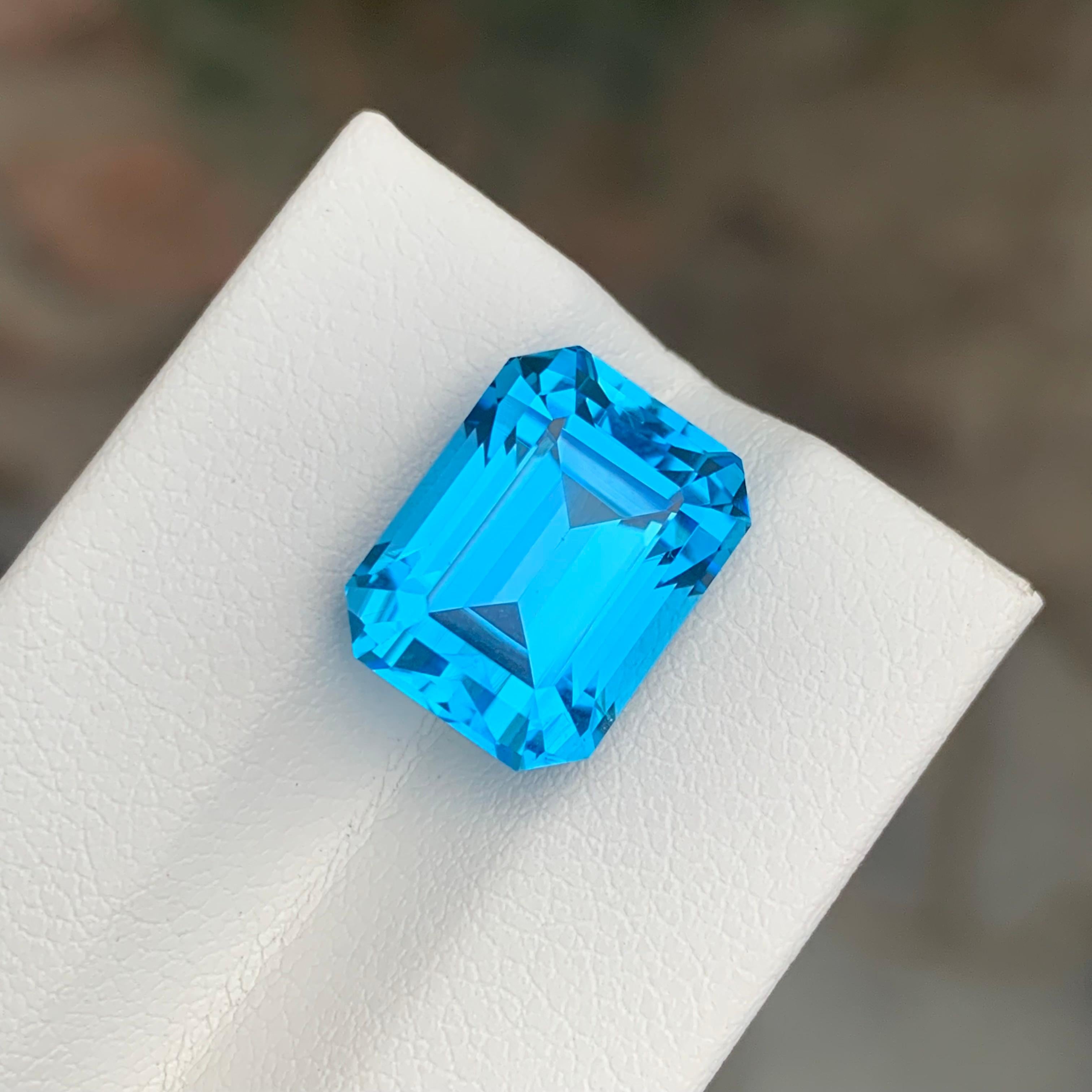 Arts and Crafts 11.90 Carat Excellent Loose Swiss Blue Topaz Emerald Shape Gemstone For Sale
