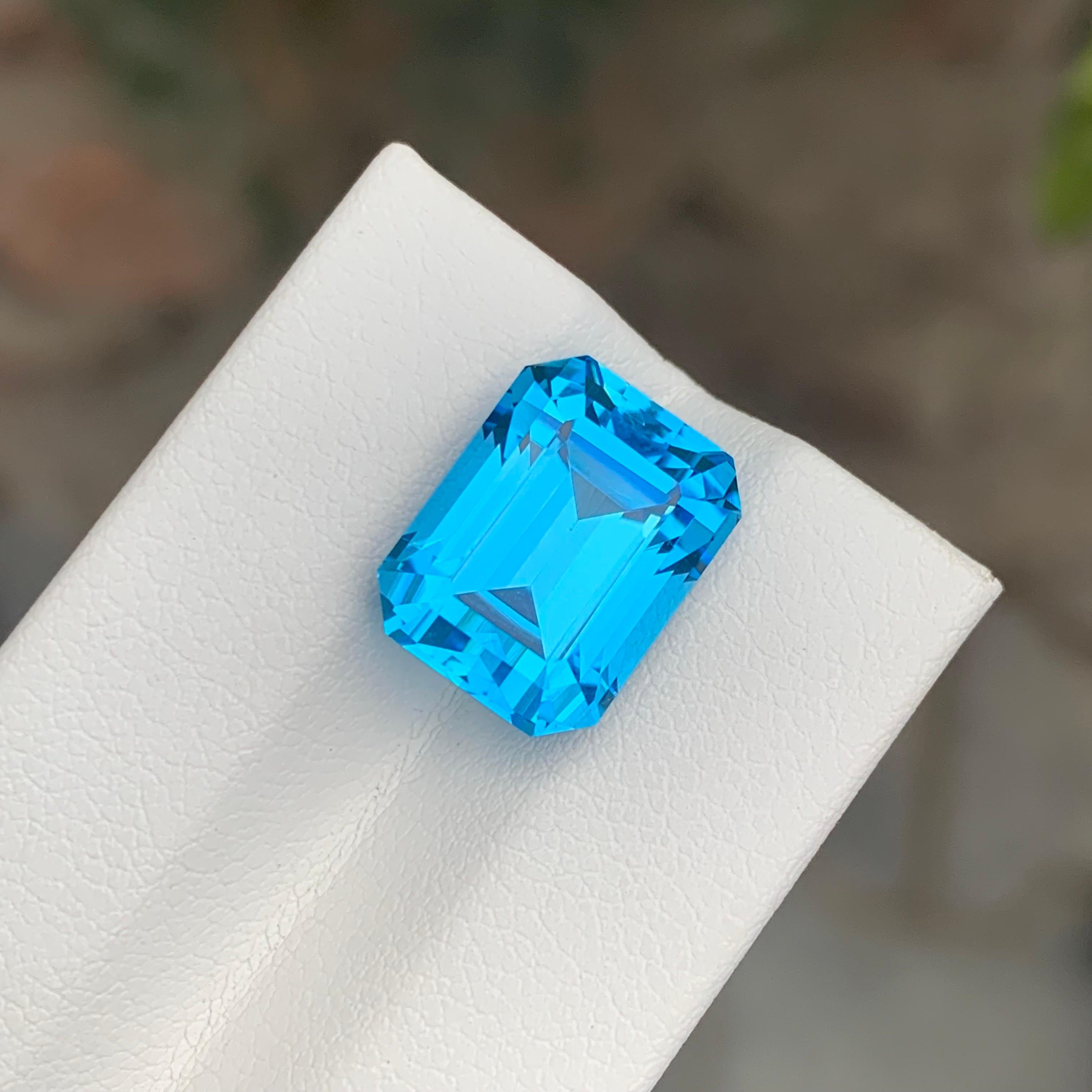 Emerald Cut 11.90 Carat Excellent Loose Swiss Blue Topaz Emerald Shape Gemstone For Sale