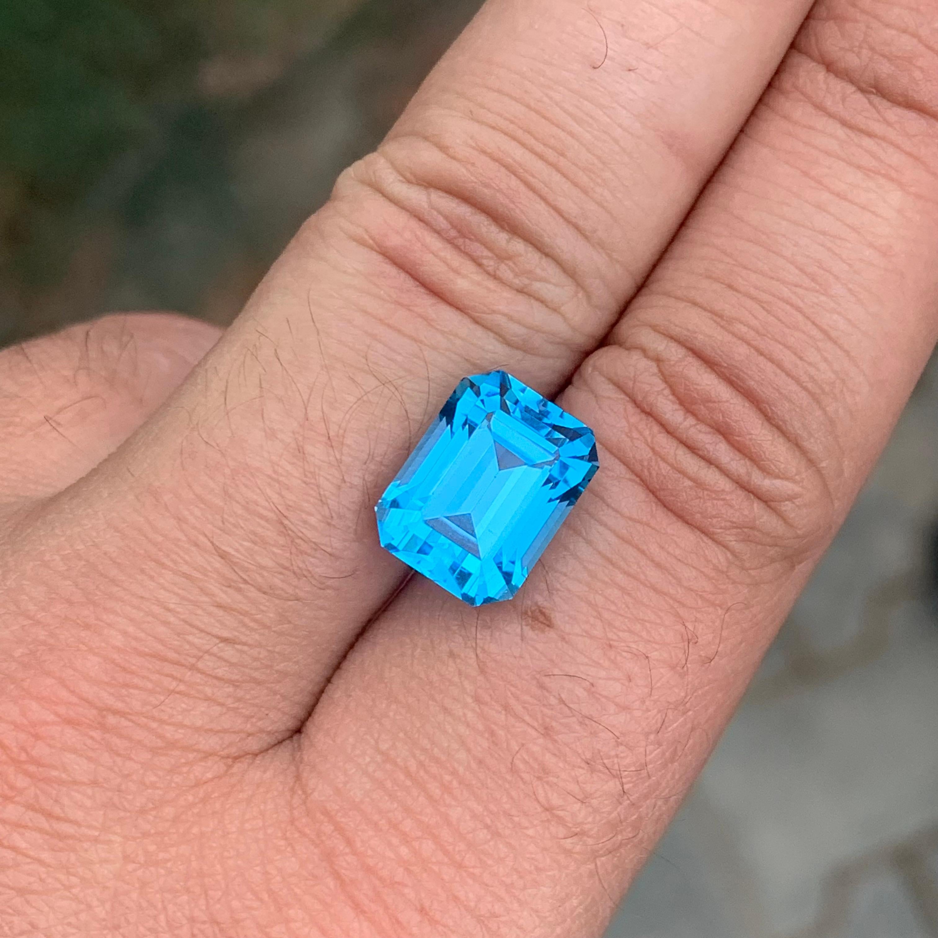 11.90 Carat Excellent Loose Swiss Blue Topaz Emerald Shape Gemstone For Sale 2