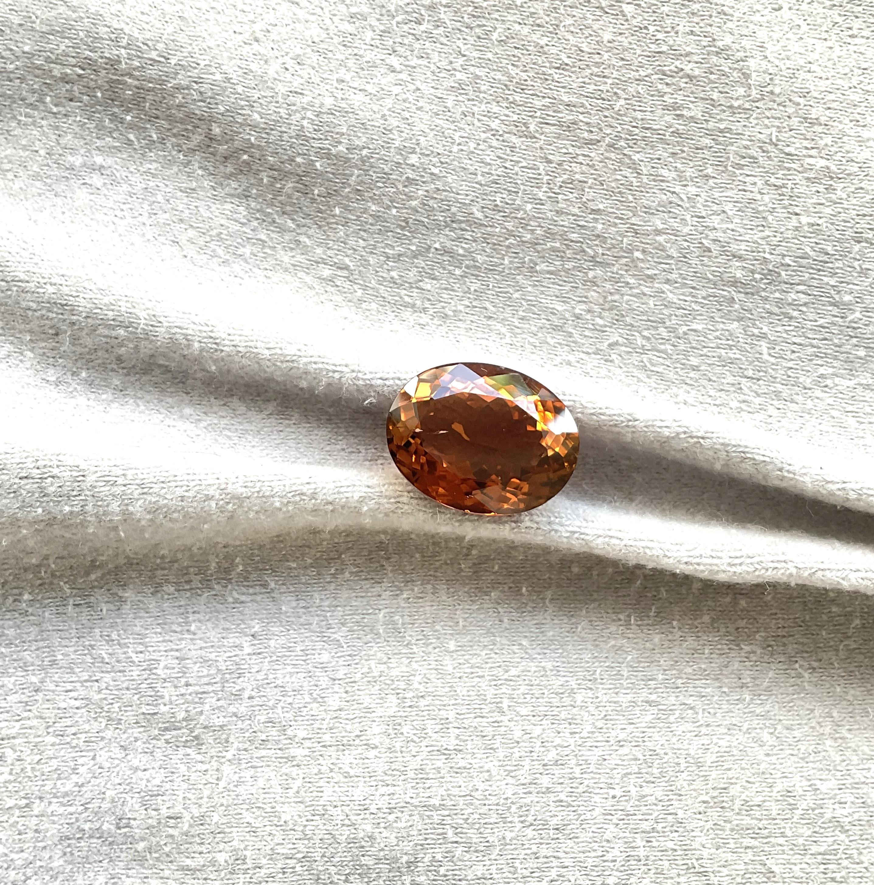Oval Cut 11.90 Carats Orange Brown Tourmaline Oval Faceted Cut Stone Natural Gemstone For Sale