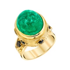 11.91 Carat Emerald Cabochon, Black Diamond Yellow Gold Dome Engraved Bezel Ring