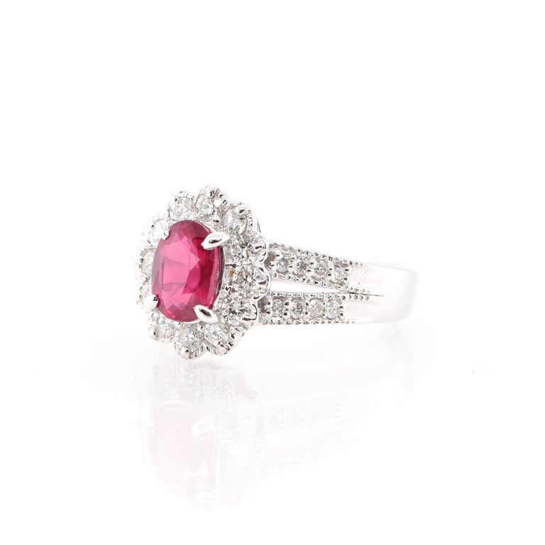 A beautiful Cocktail Ring featuring a 1.191 Carat No Heat (Untreated) Ruby and 0.55 Carats of Diamond Accents set in Platinum. Rubies are referred to as 