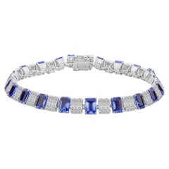 11,91 Karat. Tennisarmband aus 18-karätigem Weißgold mit blauem Saphir und Diamanten (2,90 Karat)