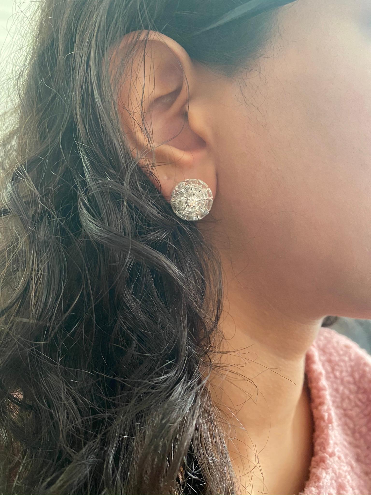 Inspired by the windflower, these earring feature 11.92 carats rose cut diamonds, set intricately around a 0.25 carat center round brilliant diamonds, in a floral motif.

Diamond Details
Shape Triangular Rose Cut 
Color F
Clarity VVS
Weight 11.91