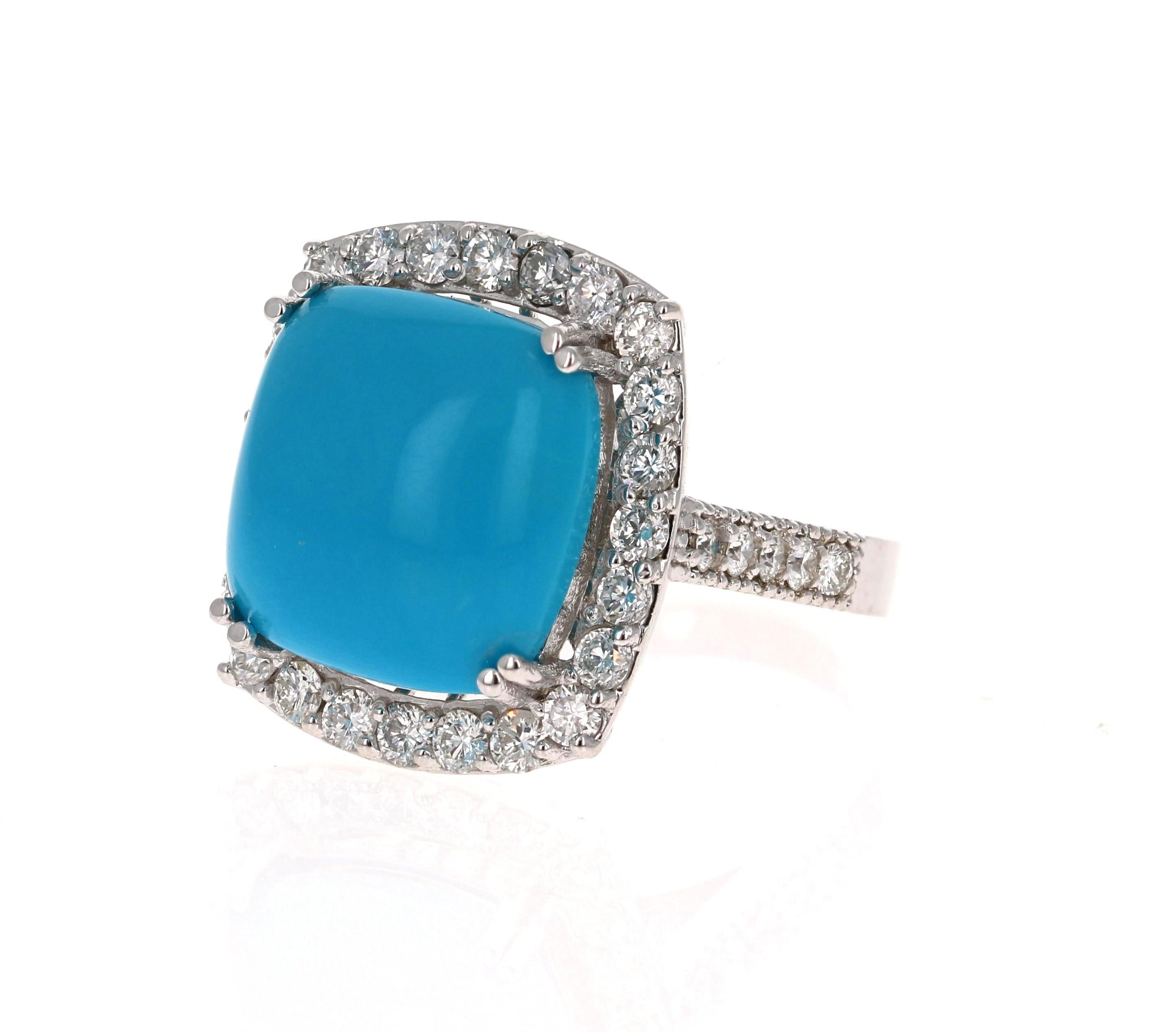 This is an exceptional and unique beauty! 

The Cushion Cut Turquoise is 10.56 Carats and is surrounded by a row of beautifully set diamonds. There are 34 Round Cut Diamonds that weigh 1.36 Carats (Clarity: SI2, Color: F). The total carat weight of
