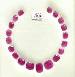 119.24 carats ruby Mozambique cut stone cushion 19 Pieces layout heated natural