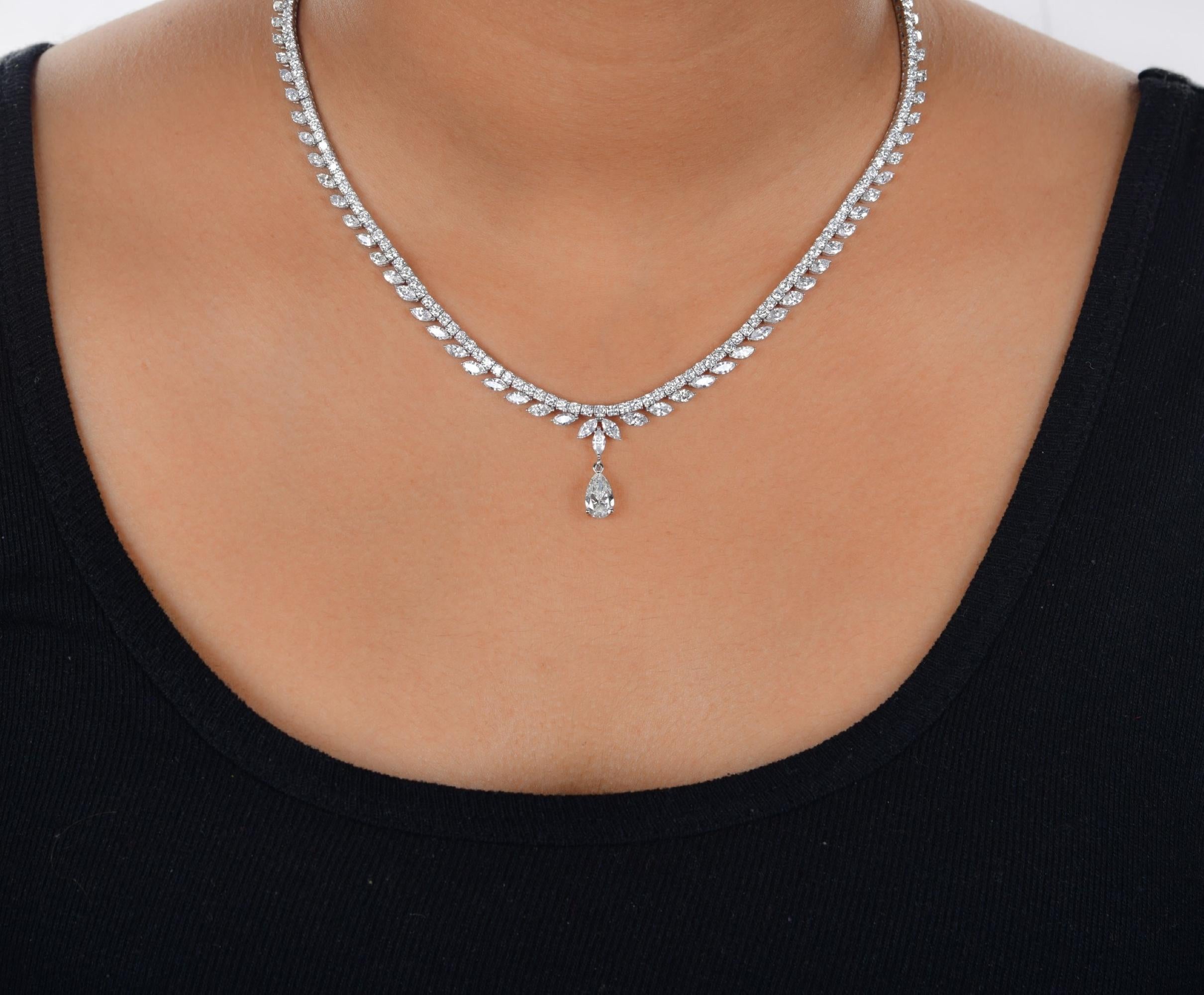 11.92Ct Marquise und Runde SI/H Diamant Hochzeit Tropfen Halskette 14k Weißgold
Diese Halskette ist aus den feinsten natürlichen Diamanten gefertigt, die für ihr unvergleichliches Funkeln und ihren zeitlosen Reiz bekannt sind. Diamanten im