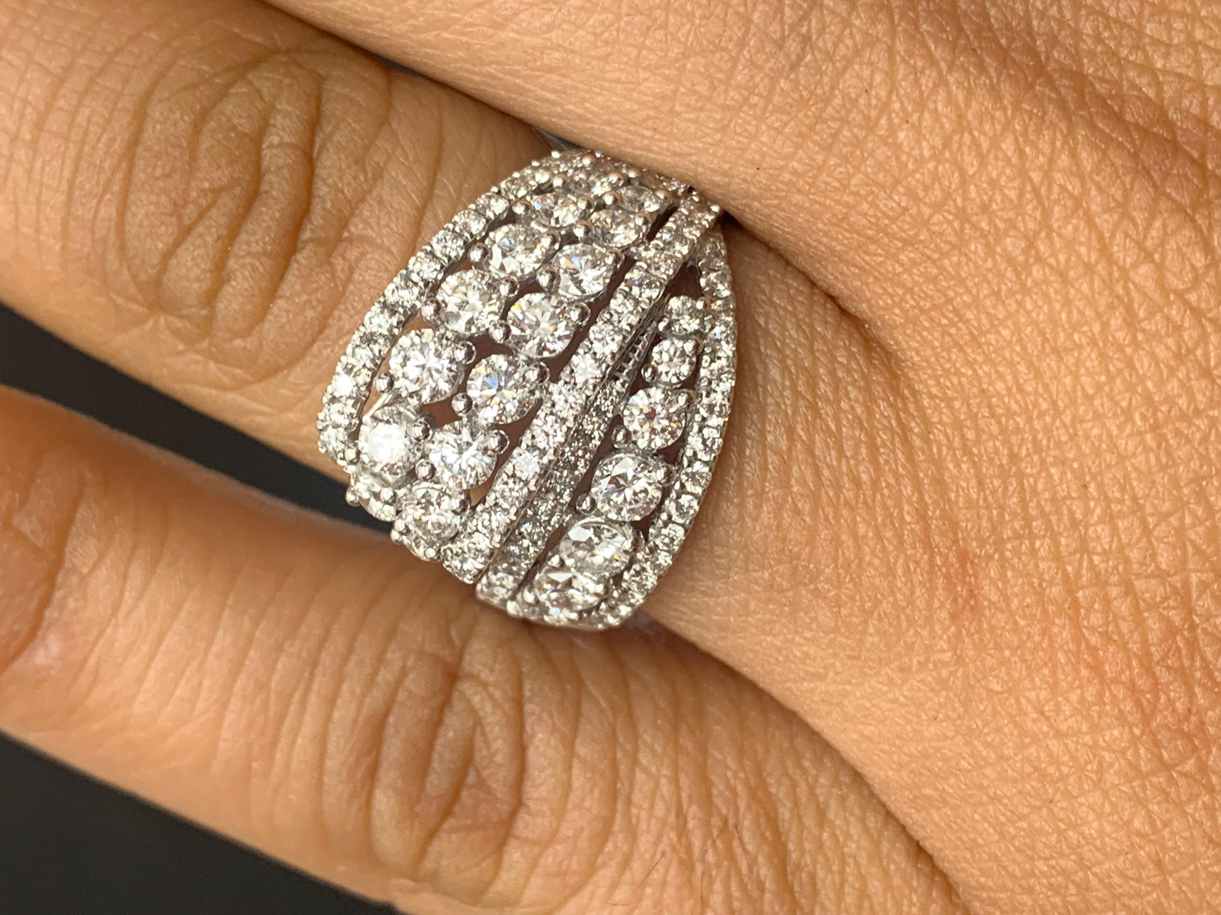 A beautiful and unique cocktail ring showcasing 94 brilliant round cut diamonds weighing 1.93 carats. Set in a cluster design setting. Made in 18k white gold 

Style available in different price ranges. Prices are based on diamond size and