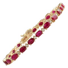 Armband aus 1 Karat Gelbgold mit Rubin und Diamanten 