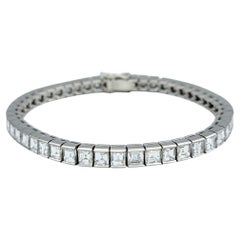 Bracciale tennis con diamanti quadrati taglio Step da 11,95 carati totali in platino lucido