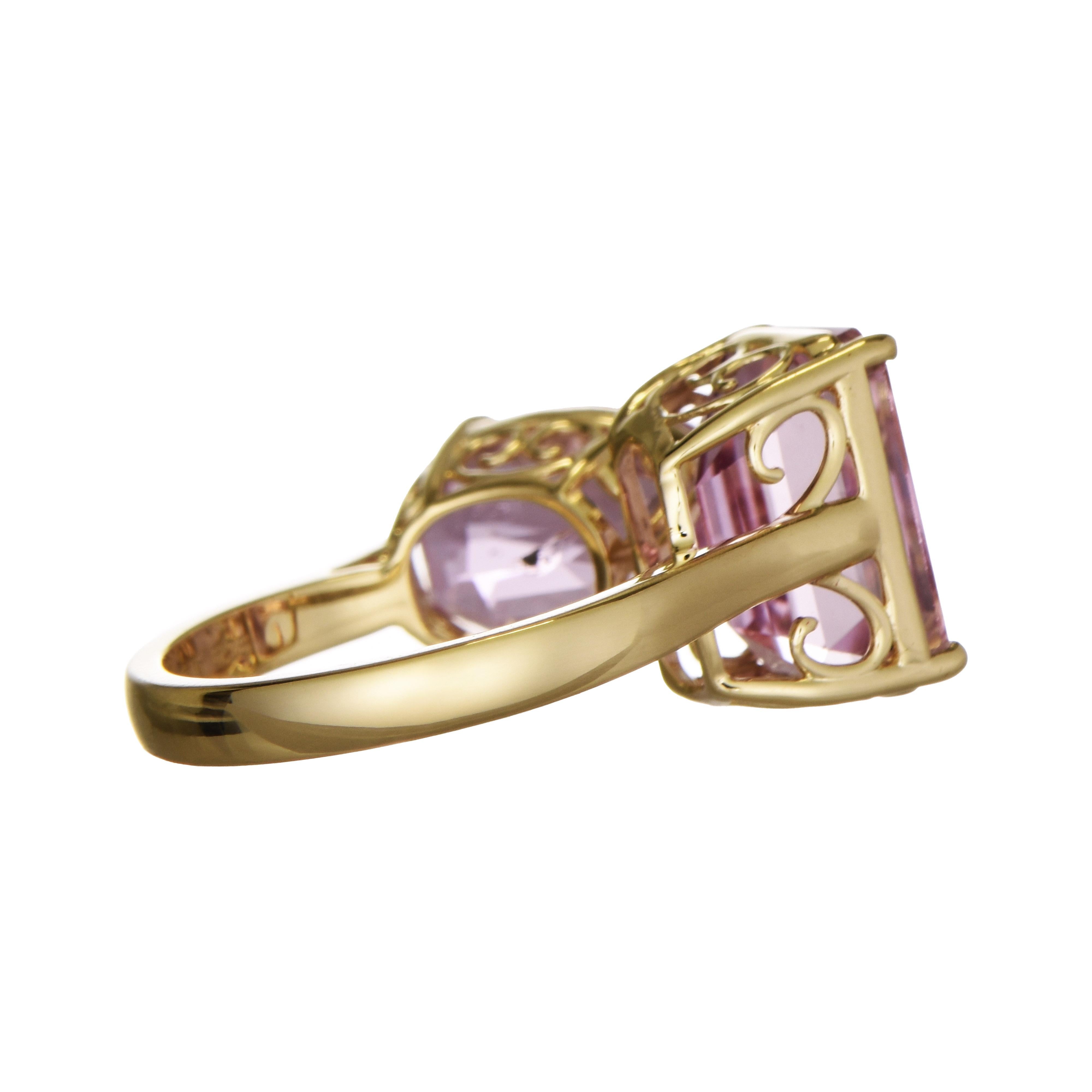 This elegant ring showcases two stunning kunzite gemstones, with different cuts that add an asymmetrical yet balanced design, all set in yellow gold.

2 Kunzite Gemstones: 11.96 Carats, Emerald Cut (left) and Oval Cut (right)
Metal: 18K Yellow Gold,