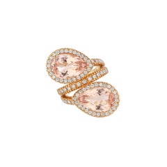 11, 99 ct Pear-Cut Tourmaline and White Brilliant cut Diamonds Bypass Gold Ring