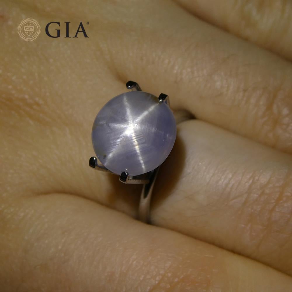 This is a stunning GIA Certified Star Sapphire


The GIA report reads as follows:

GIA Report Number: 5221841122
Shape: Oval
Cutting Style: Double Cabochon
Cutting Style: Crown:
Cutting Style: Pavilion:
Transparency: Semi-Transparent
Color:
