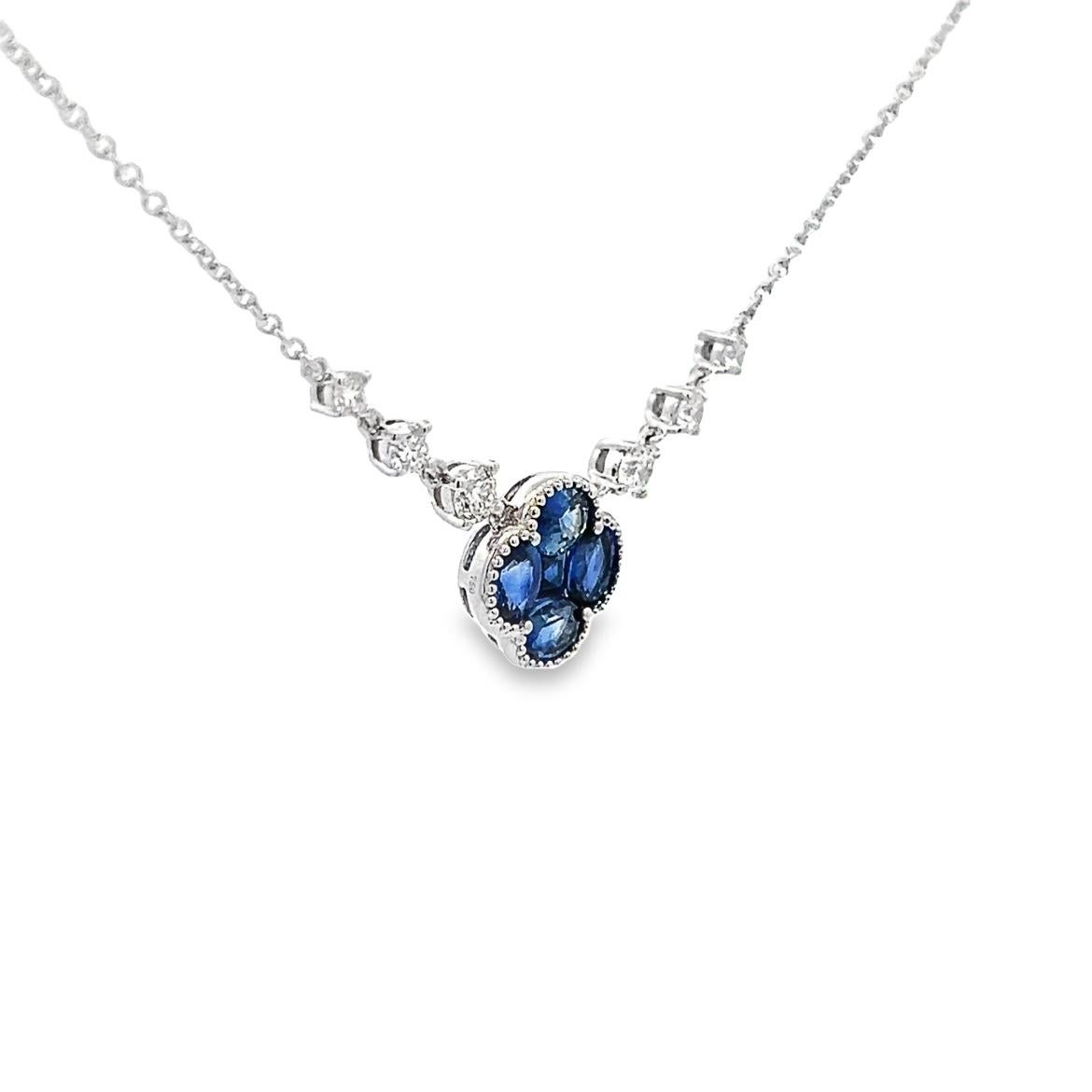 Looking for a unique and unforgettable gift? Look no further! This exquisite Blue Sapphire flower, accented with small Diamonds, is set in 18k white gold with an adjustable sizing lock and is perfect for any special occasion. Whether it's an