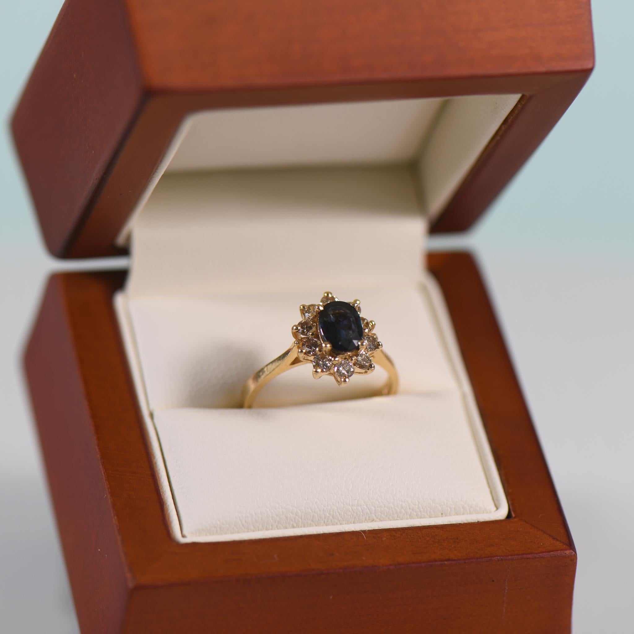 1.1ct Midnight Blue Sapphire Oval 0.33cttw Diamond Cluster 14K Gold Ring For Sale 2