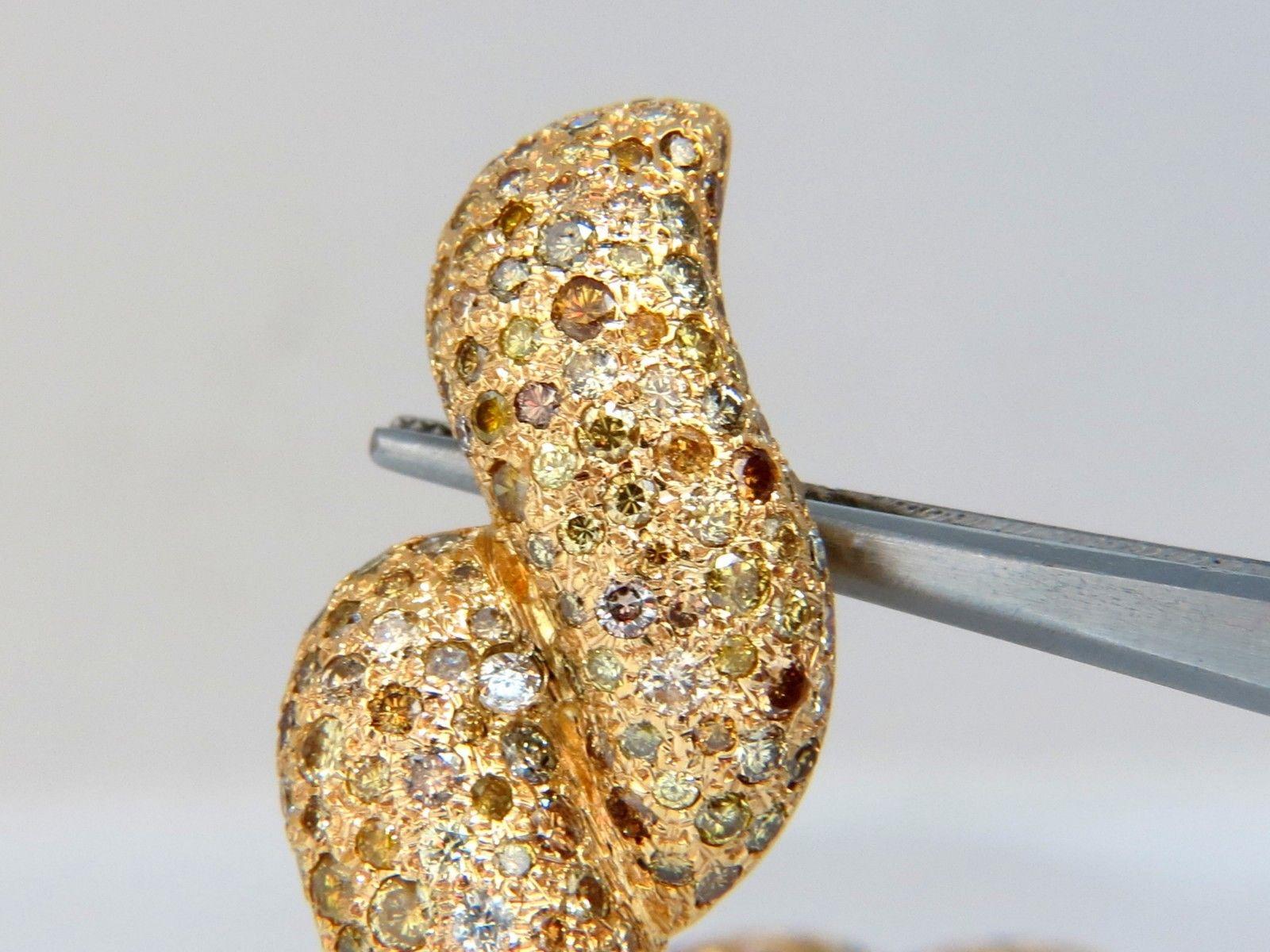 11ct. Natural Fancy color diamonds clip earrings.

Fancy Yellow, Orange, Brown, and olive.

Vs-1 Vs-2 & Si-1 clarity.

Rounds, full cuts.

14kt. yellow gold.

1.9 x .78 inch

Comfortable omega clips.

$24,000 appraisal will accompany