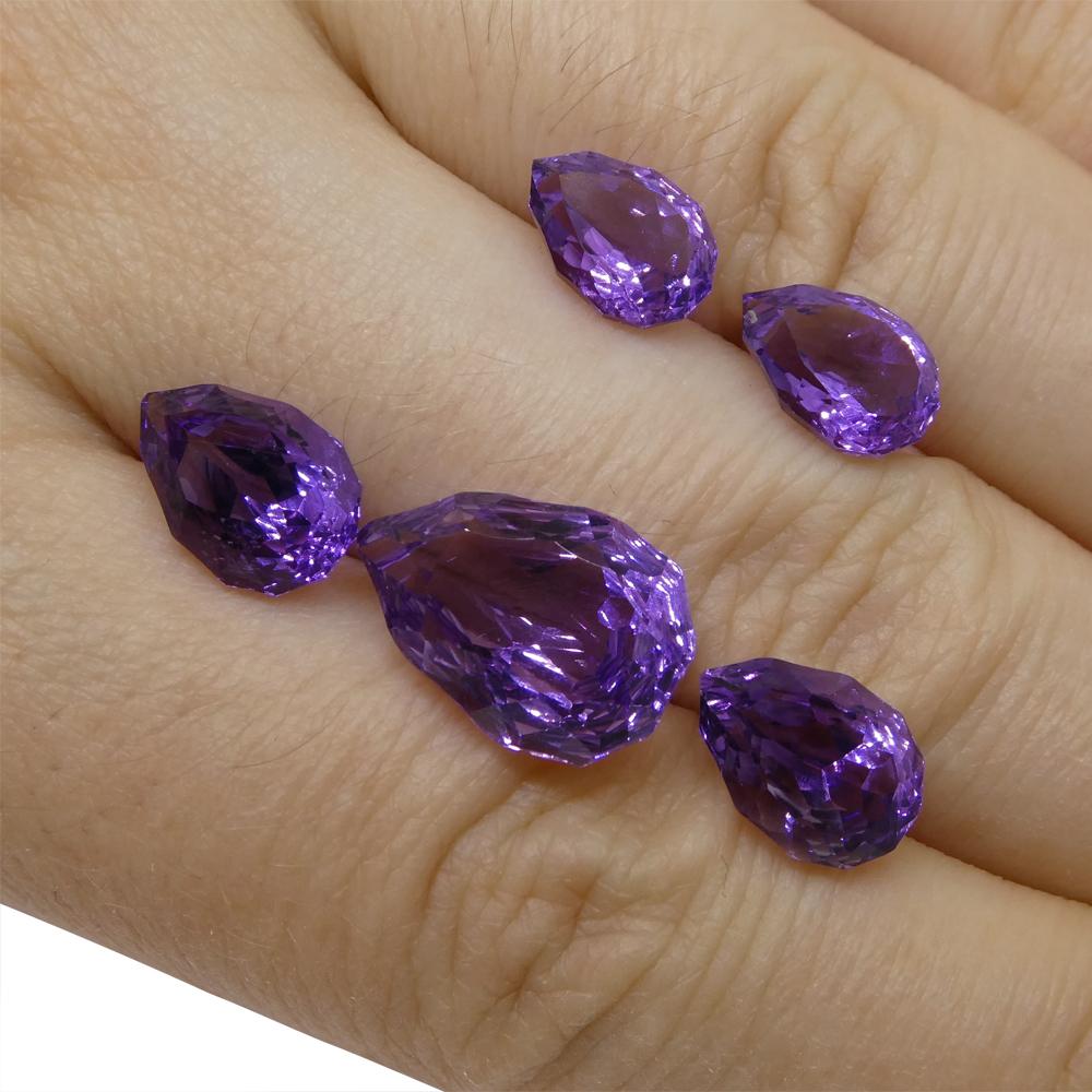 Description:

Gem Type: Amethyst
Number of Stones: 5
Weight: 11 cts
Measurements: 2x 9.00 x 6.00 mm, 2x 10.00 x 7.00 mm / 1x 14.00 x 10.00 mm
Shape: Pear
Cutting Style Crown: Modified Brilliant
Cutting Style Pavilion: Mixed Cut
Transparency: