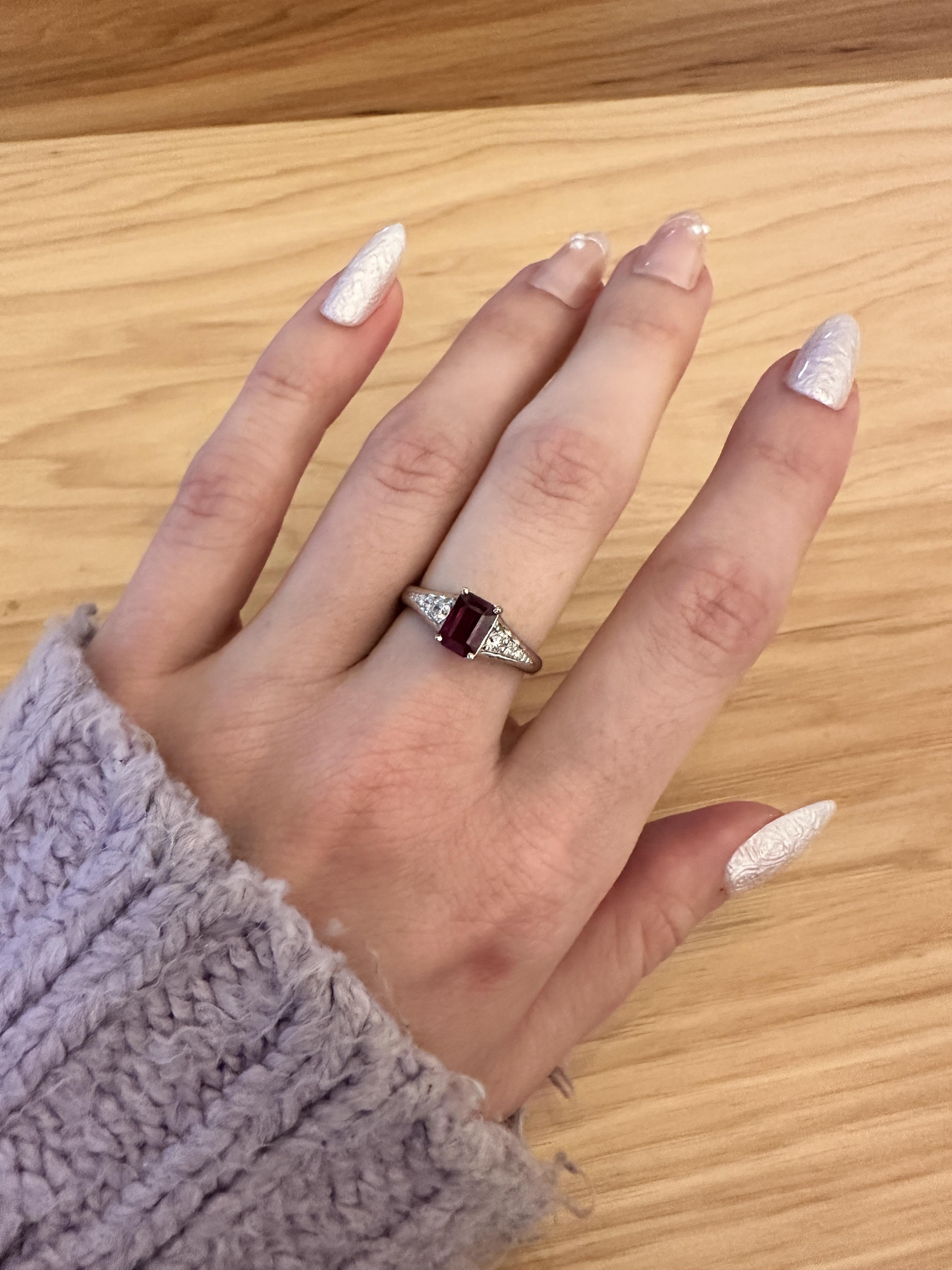 This tapered engagement ring showcases a stunning 1.11 carat Ruby with natural earth mined diamonds, all set in solid 14K white gold. This Ruby ring makes a beautiful July birthstone gift for your loved ones!

**We offer complimentary resizing,