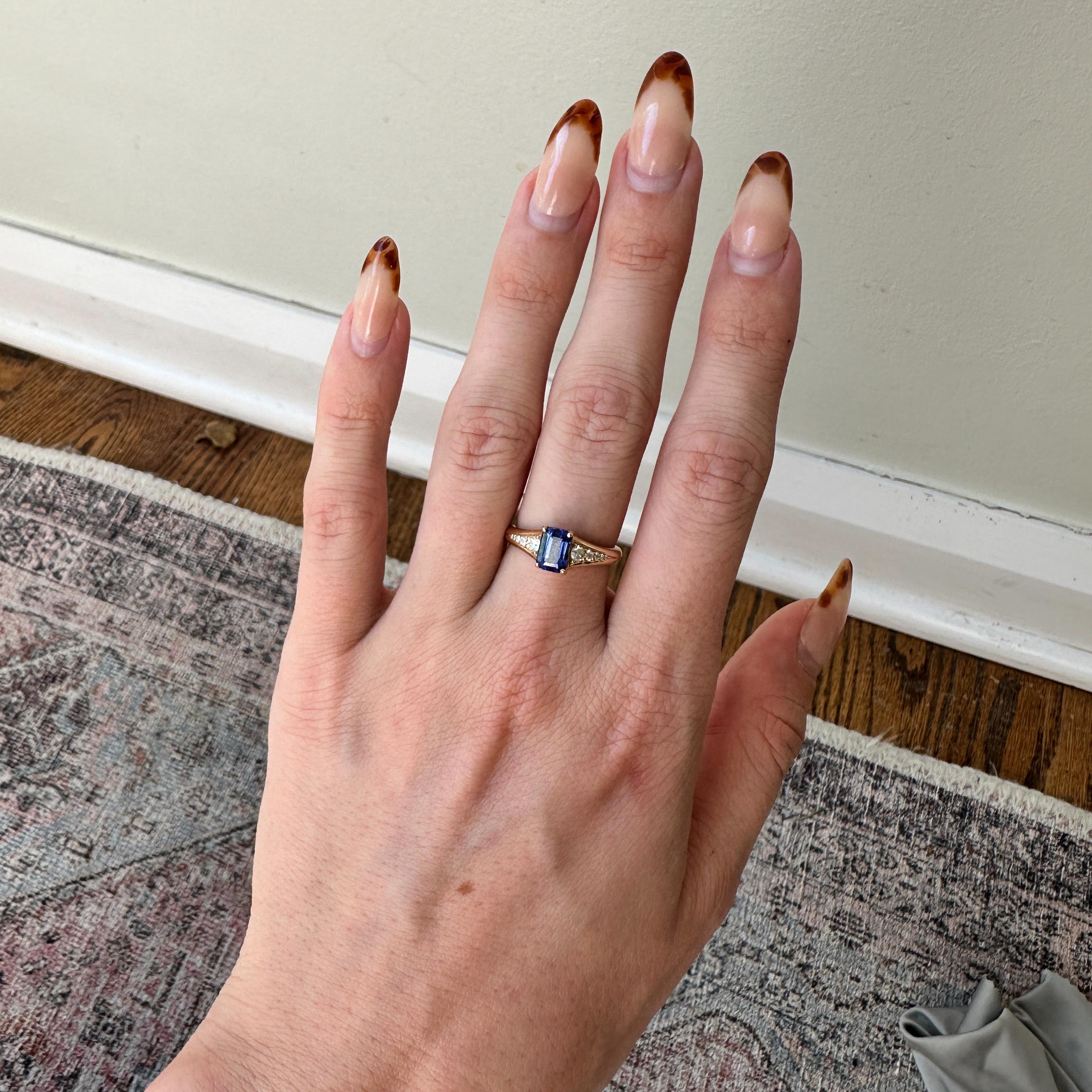 This exquisite ring showcases a stunning 1.18 carat Tanzanite with natural earth mined diamonds, all set in solid 14K gold. This Tanzanite ring makes a beautiful December birthstone gift for your loved ones!

Specifications

Item Type: Ring
Center