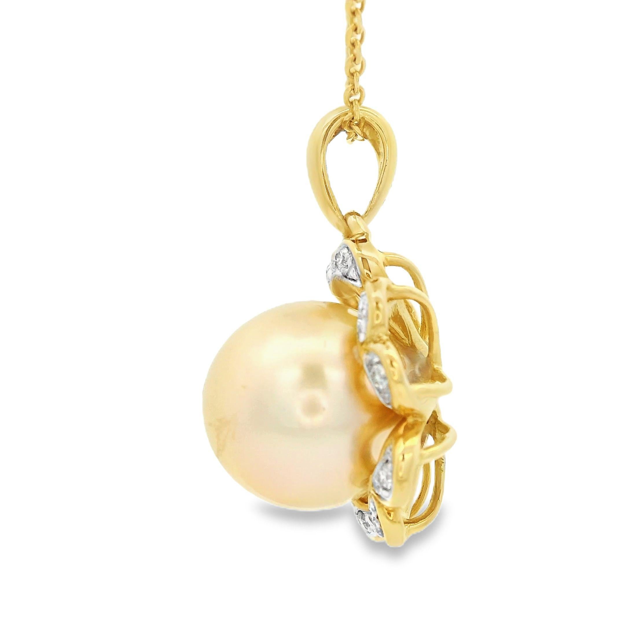Elevate your elegance with this stunning necklace, featuring an enchanting South Sea Pearl measuring 11mm as its centerpiece. Crafted in luxurious 18 Karat Yellow Gold, this piece exudes timeless beauty and sophistication. The pearl's captivating