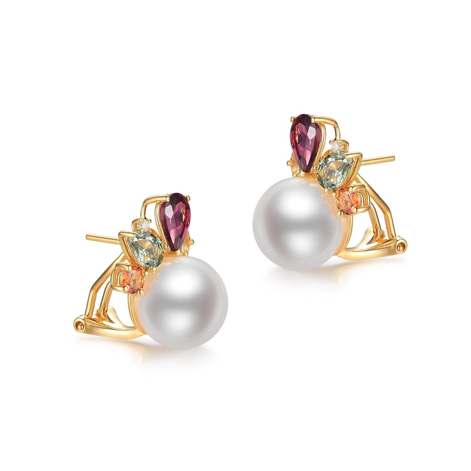 These earrings are a celebration of color and refinement, featuring the luster of South Sea pearls and the vibrancy of fancy sapphires, all set in the gleaming splendor of 18K gold-plated sterling silver. Dominating the composition is an 11mm South