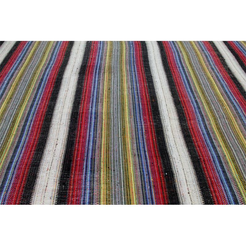 Flatweave Persian Kilim Rug 11x13– This fun rug is a beautiful flat weave Persian Kilim rug featuring a vibrant alternating multi-colored stripes design. The lightweight construction makes this rug an excellent choice for a day at the beach or even