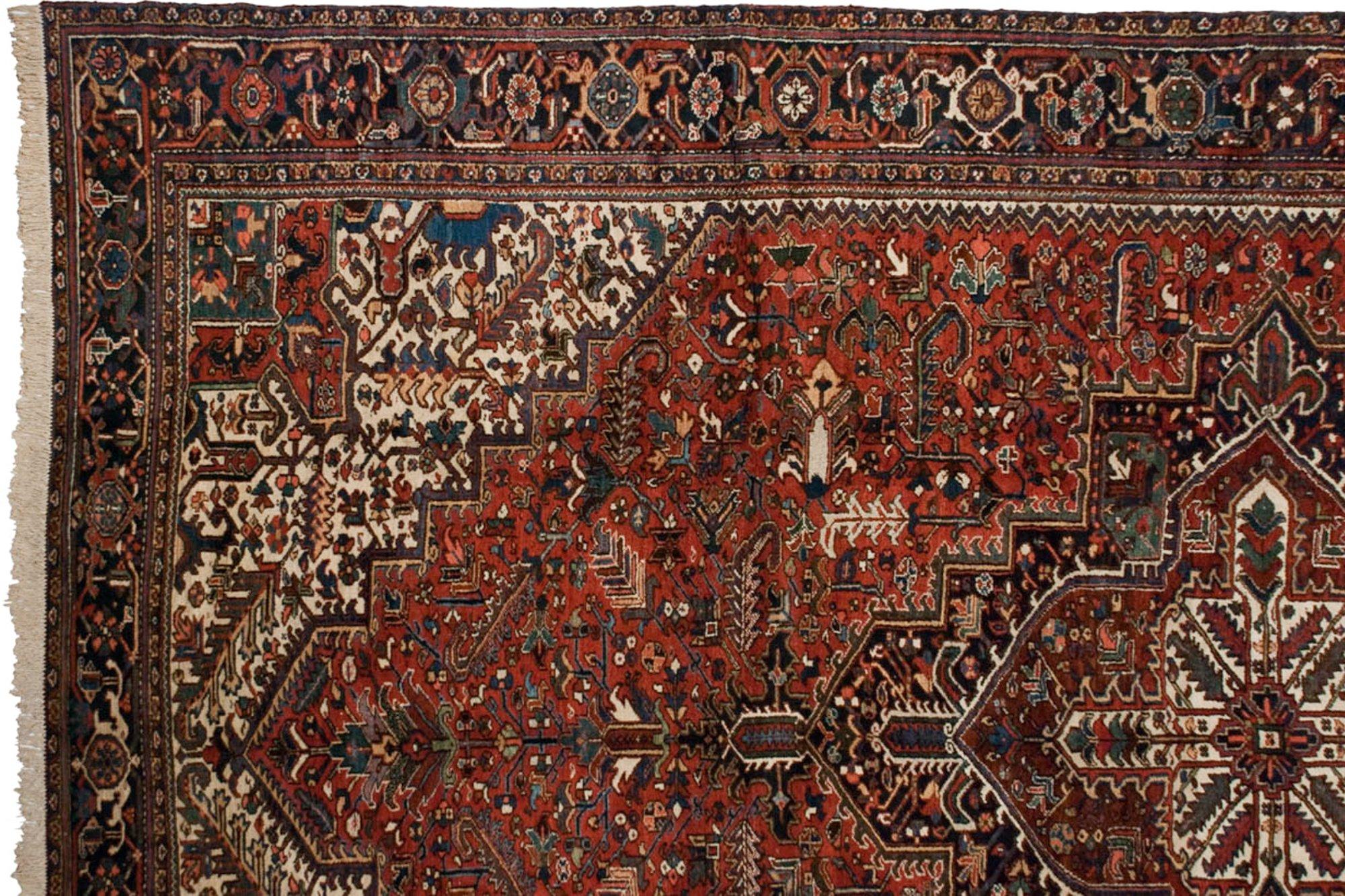 :: Fantastic earlier Mehrivan carpet in tremendous scale and unusual proportions. Concentric center medallions bursting from the middle, each bearing outwardly pointed simplistic geometric layered floral design motif, atop a covered field in