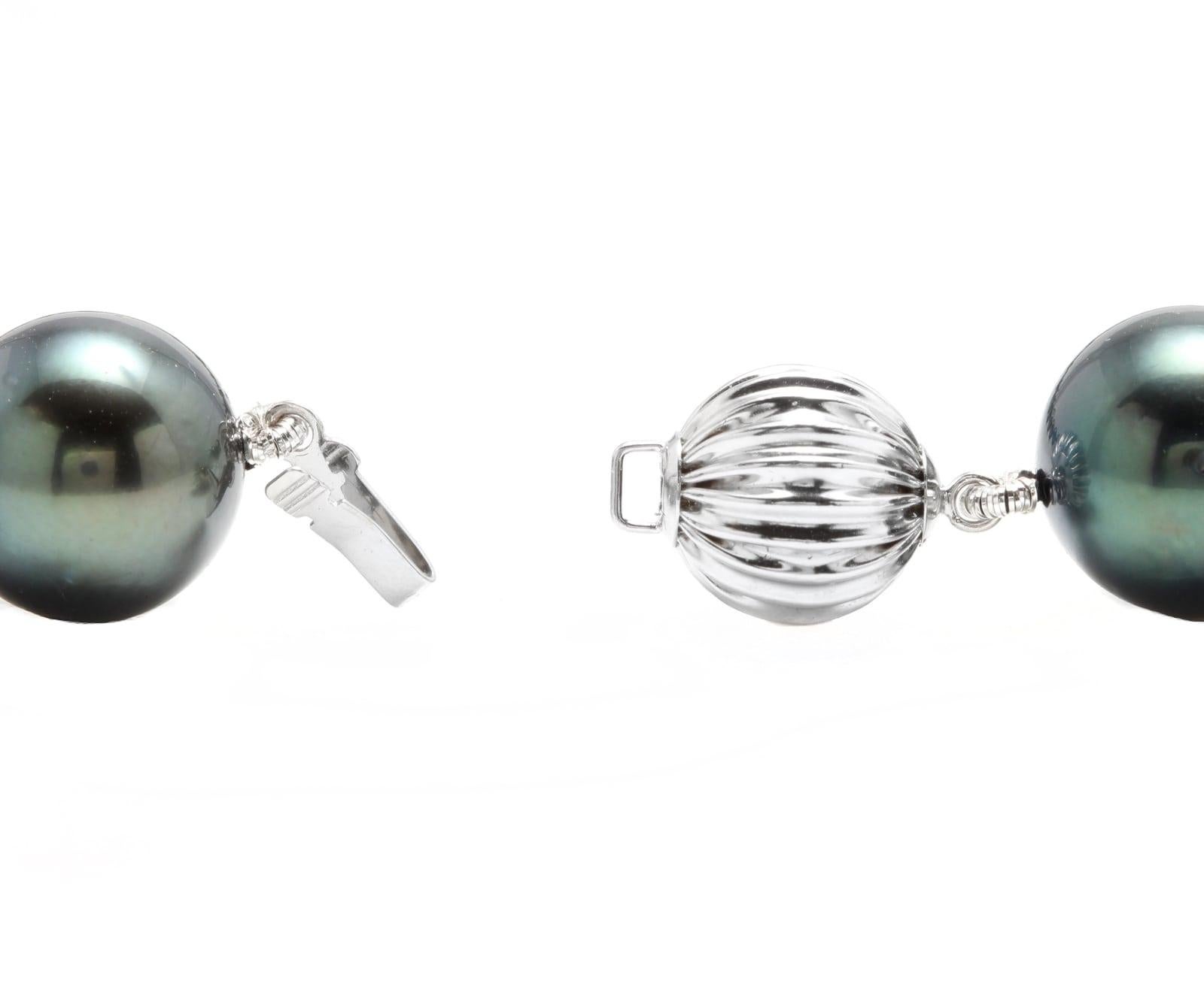 Stunning 12-14.80mm Tahitian Pearl Necklace 14K Solid White Gold Clasp 

Suggested Replacement Value: $8,000.00

Clasp 14k Solid White Gold

Total Natural Tahitian Pearls Measure: 12 - 14.80mm

Necklace Length: 18