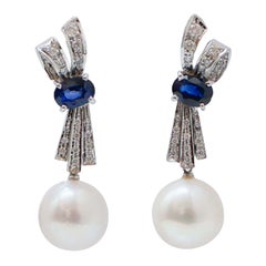 12, 5 Mm Pearls, Sapphires, Diamonds, White Gold Earrings.