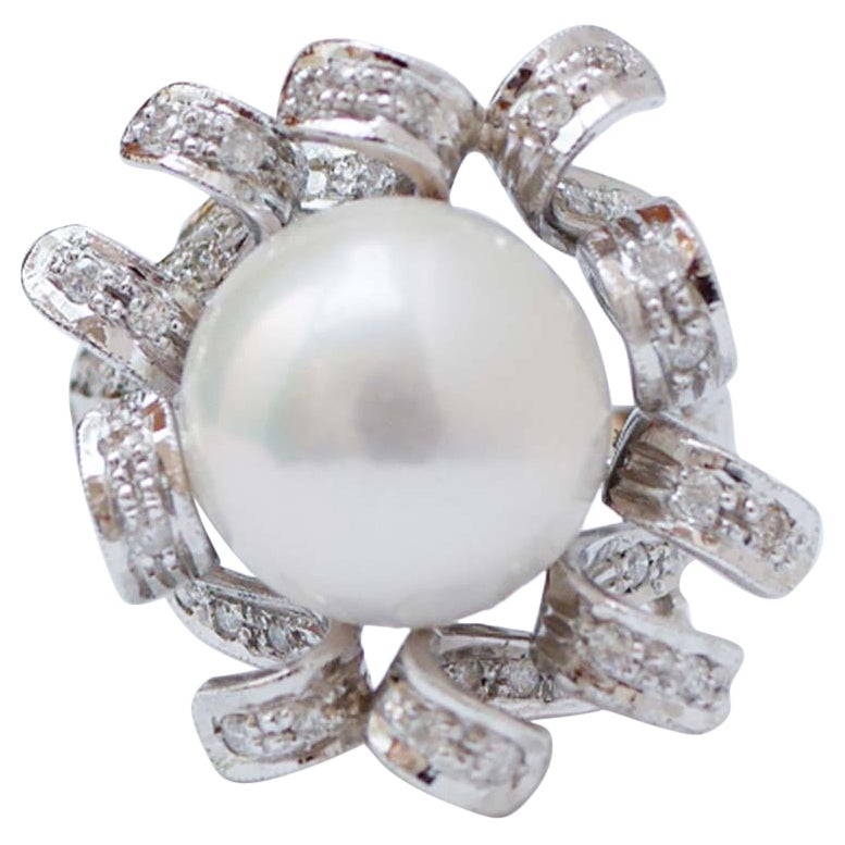 12, 5 m Weiße Perle, Diamanten, Platinring.