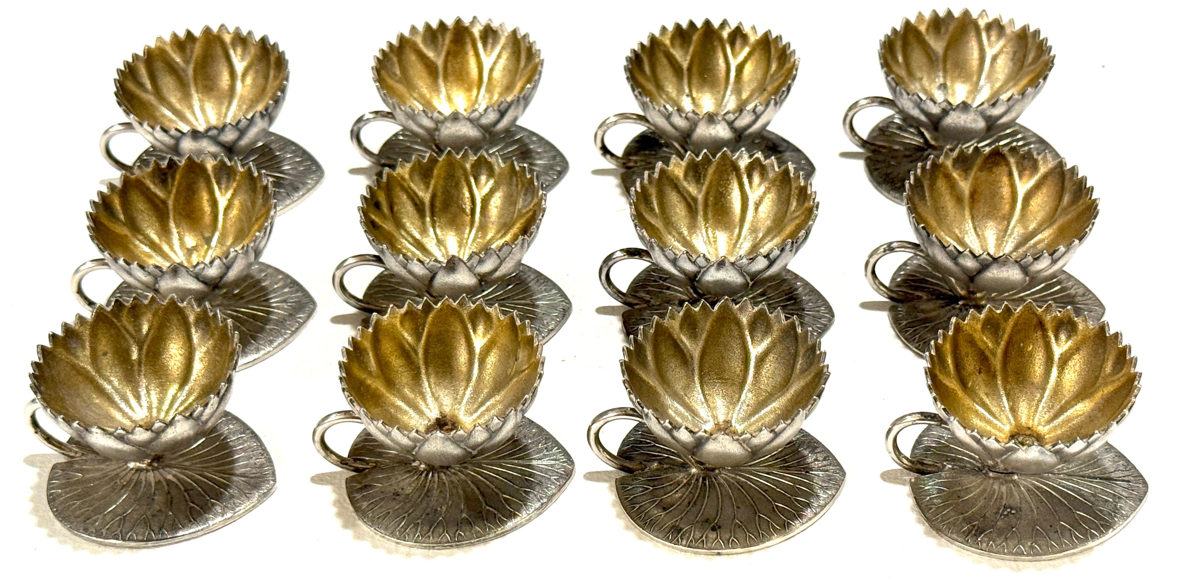 Set of 12 American Aesthetic Movement Silverplate & Goldwashed Lotus Open Salts

Meriden Britannia Company, circa 1875–1890
Dimensions: 2