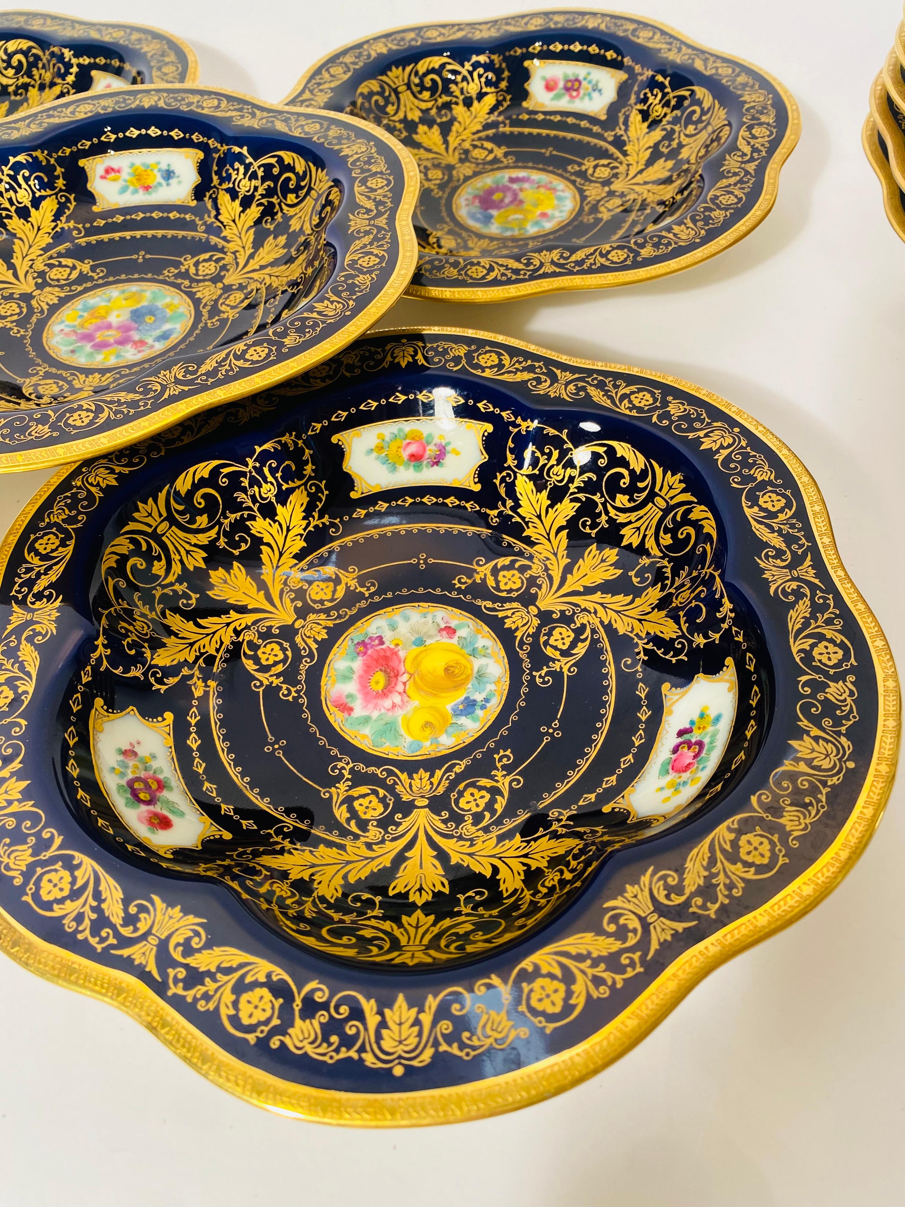 Hand-Crafted 12 Antique Cobalt Blue Hand Painted Floral Cartouches Shaped Soup or Entre Bowls