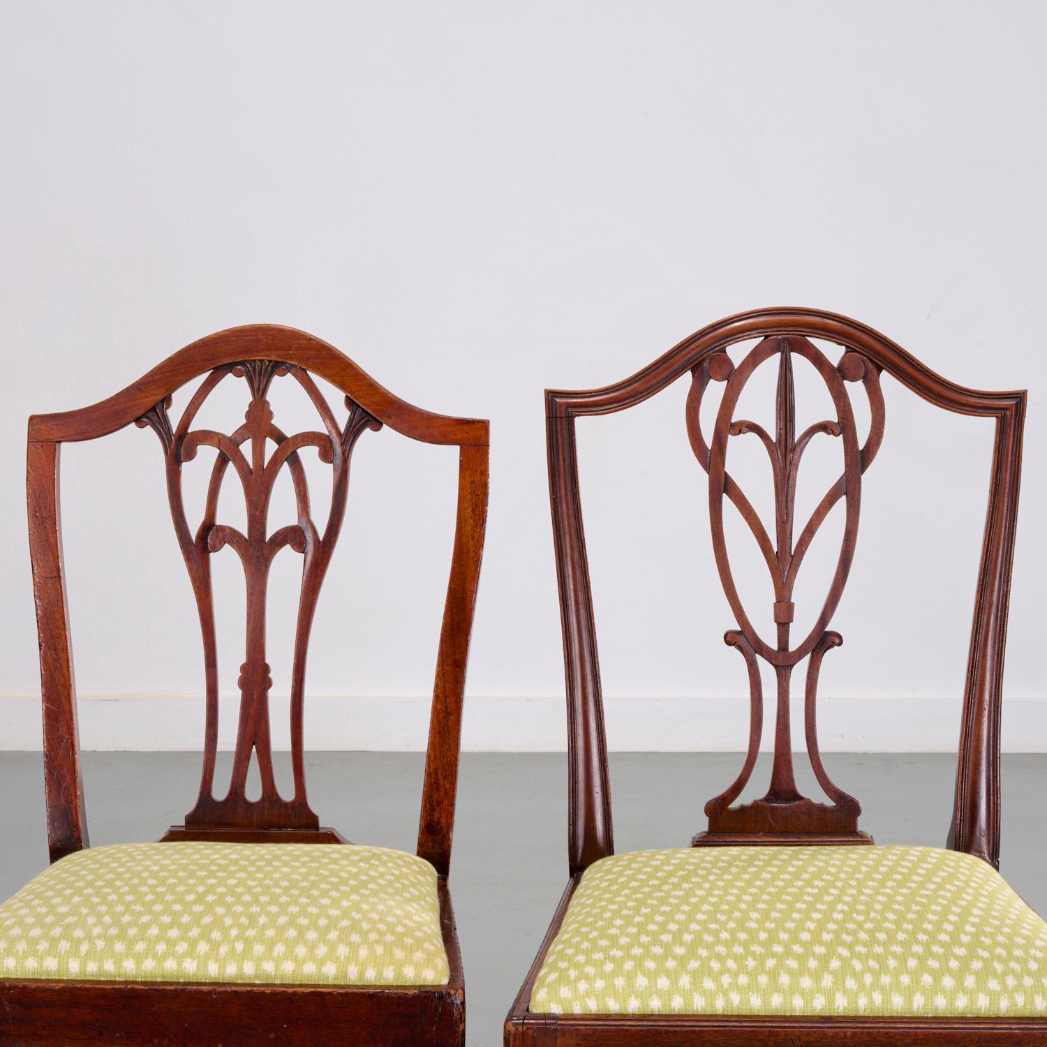 19th c. and later, England, an assembled set of dining chairs in the Hepplewhite style, (6) side chairs with pierced splat backs, and (6) side chairs of similar design, all of mahogany with pale green and cream linen upholstered drop in seats.