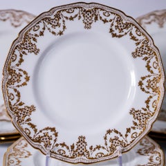 12 Antique English Raised Gilt Encrusted Salad or Dessert Plates, Circa 1910