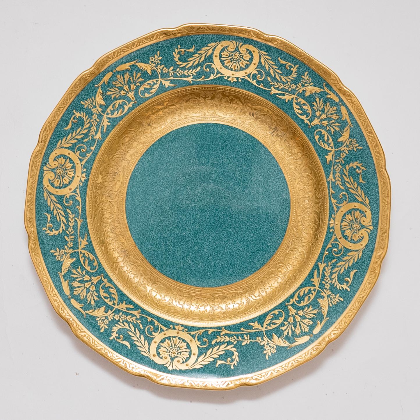 An unique set of first course, salad or dessert plates from Royal Doulton England and custom ordered through the fine Gilded Age Retailer Marshall Field, Chicago. This design features the classic Robert Allen shape and a vibrant green powder finish