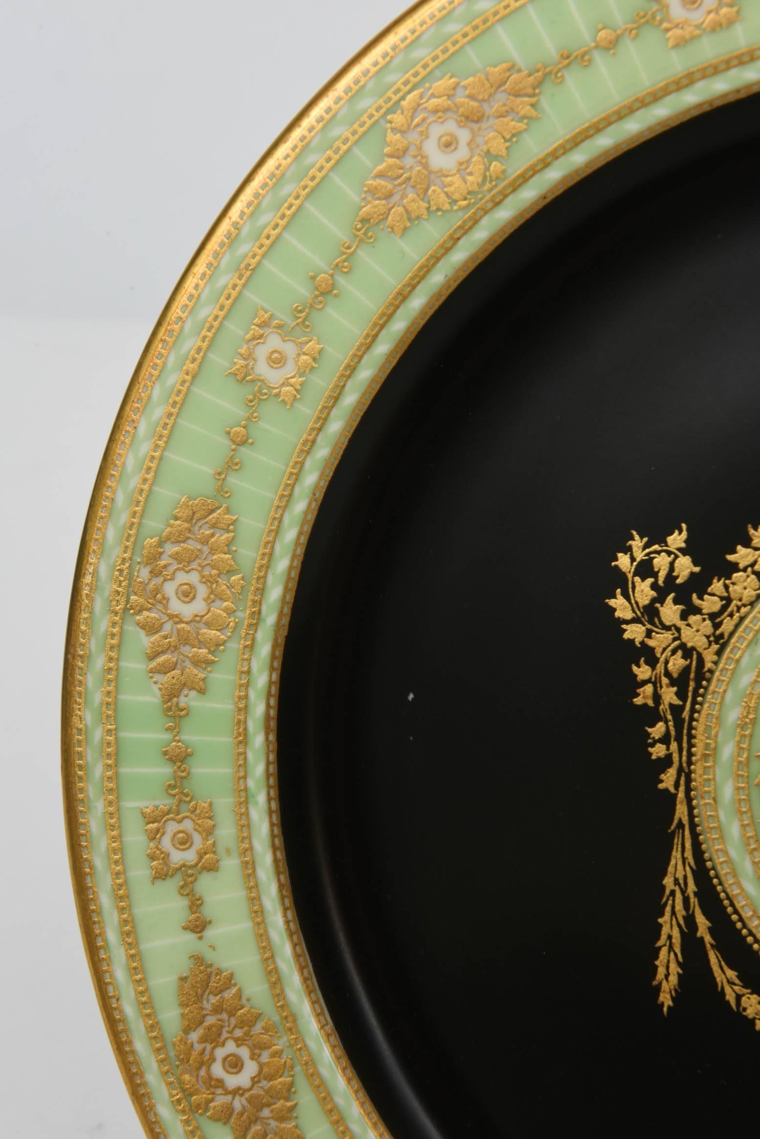 From Royal Worcester England an interesting set of 12 plates that feature a centre medallion with gilt foliate design through out. In addition to making a great first course impression or dessert plate, they will look stunning in your cabinet