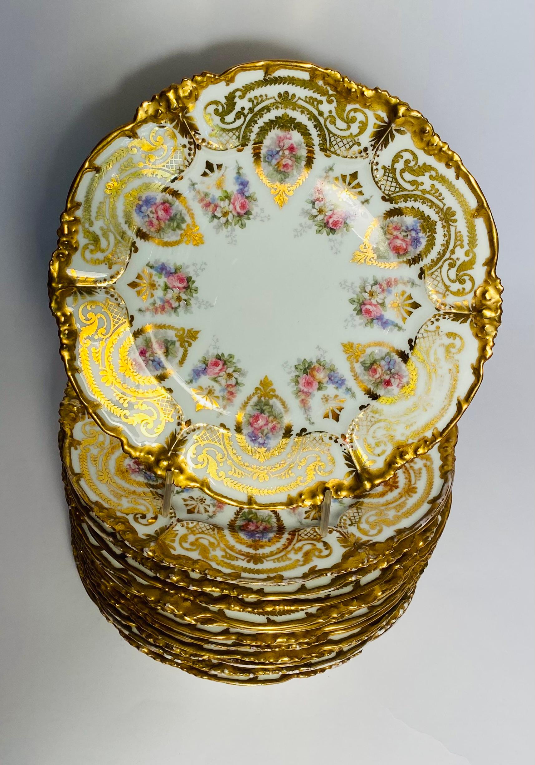 French 12 Antique Limoges Floral & Gilt Shaped Dessert Plates. Circa 1890 For Sale